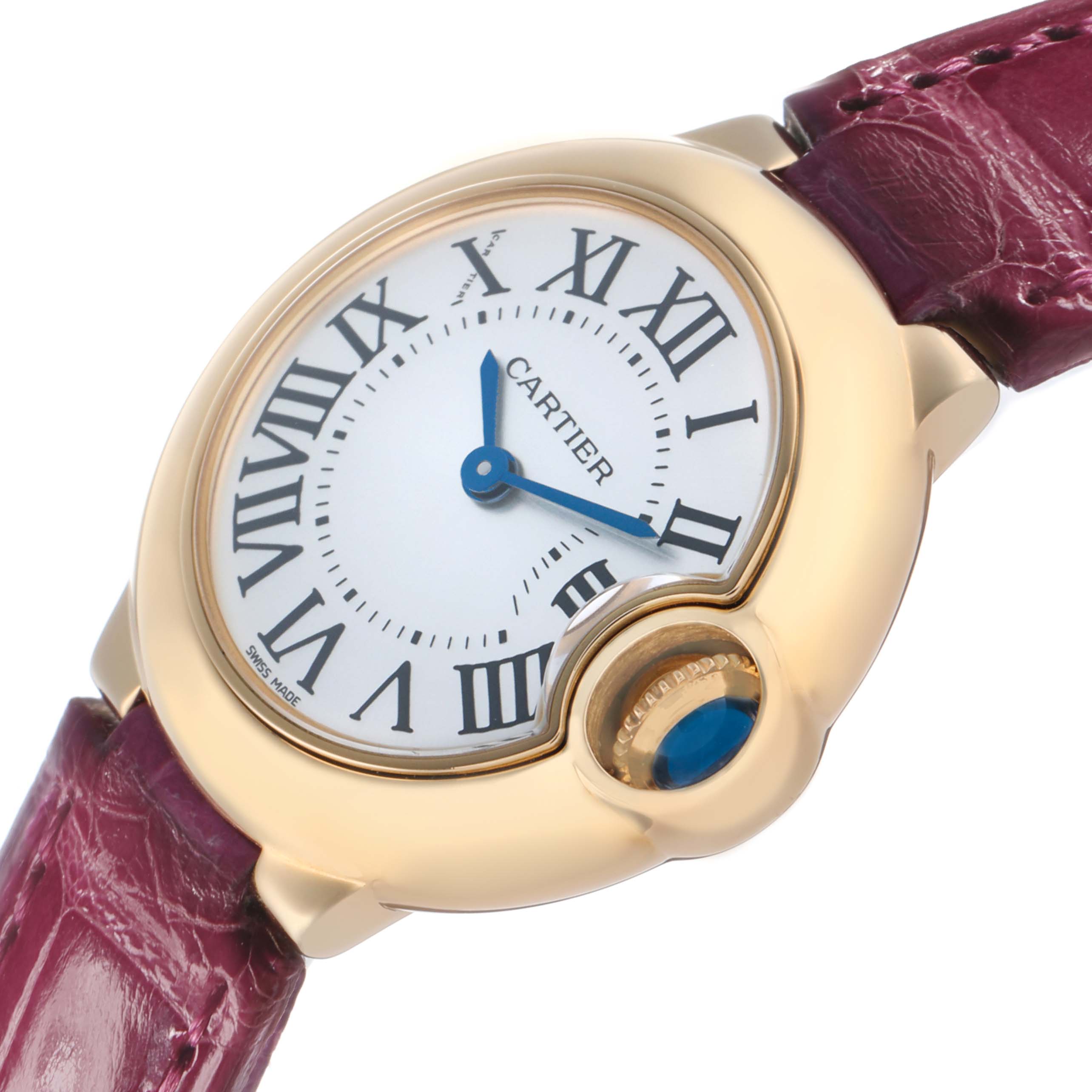 The Cartier Ballon Bleu W6900156 Women's Yellow Gold Silver Dial watch is shown at an angle displaying the dial, crown with blue cabochon, and part of the strap.