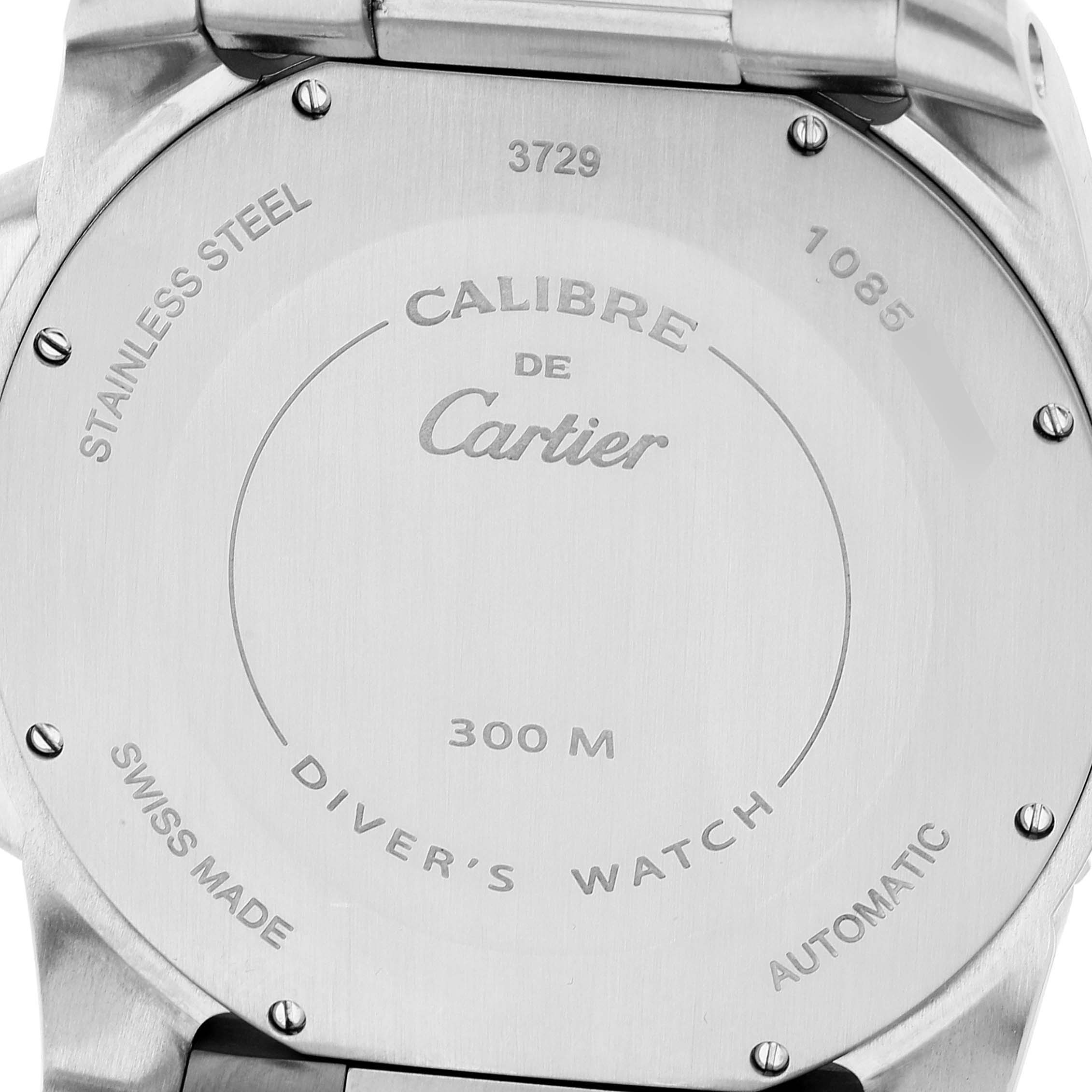 This image shows the back case of the Calibre de Cartier watch, featuring branding and specifications.