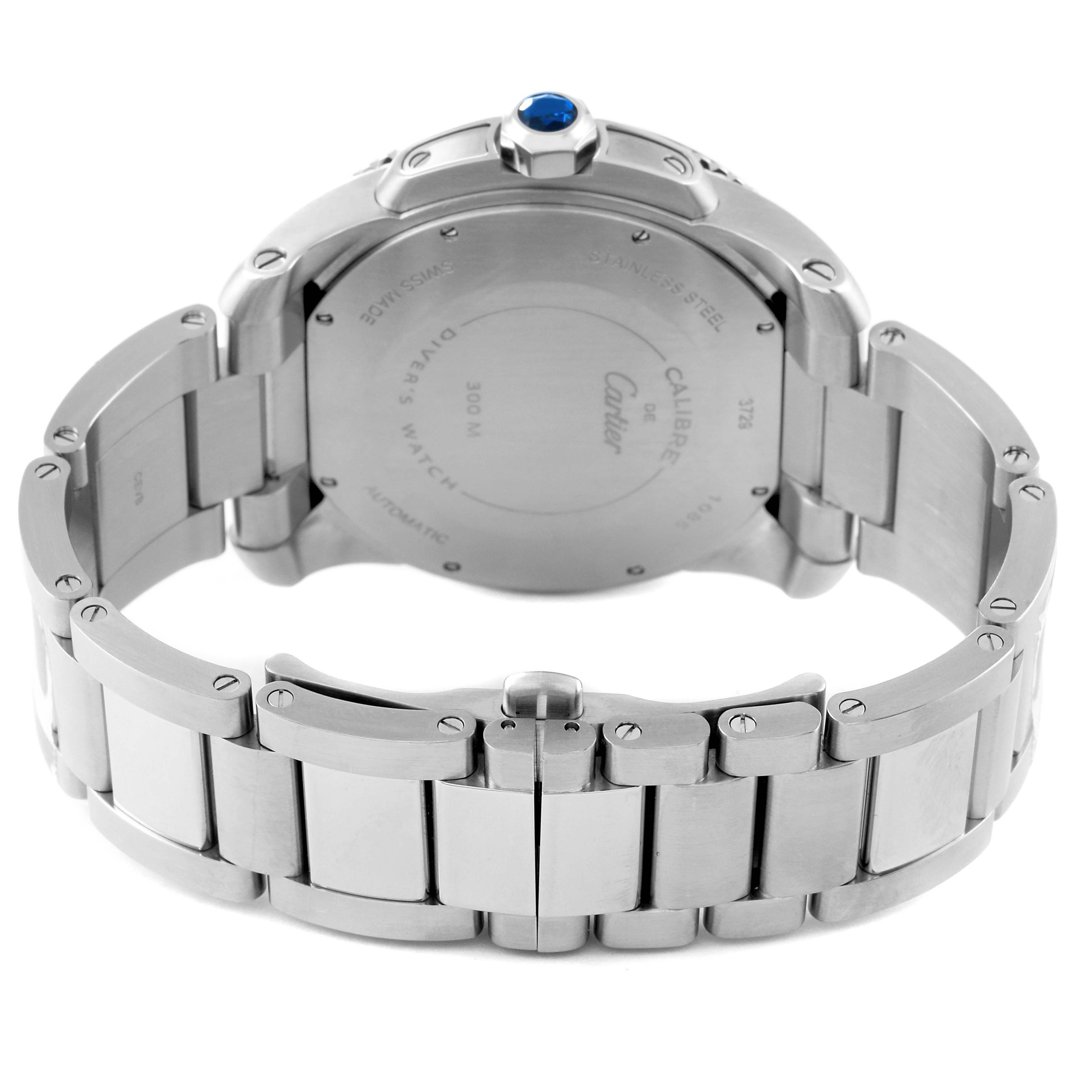 The image displays the back view of the Calibre de Cartier watch by Cartier, showing its bracelet and case back.