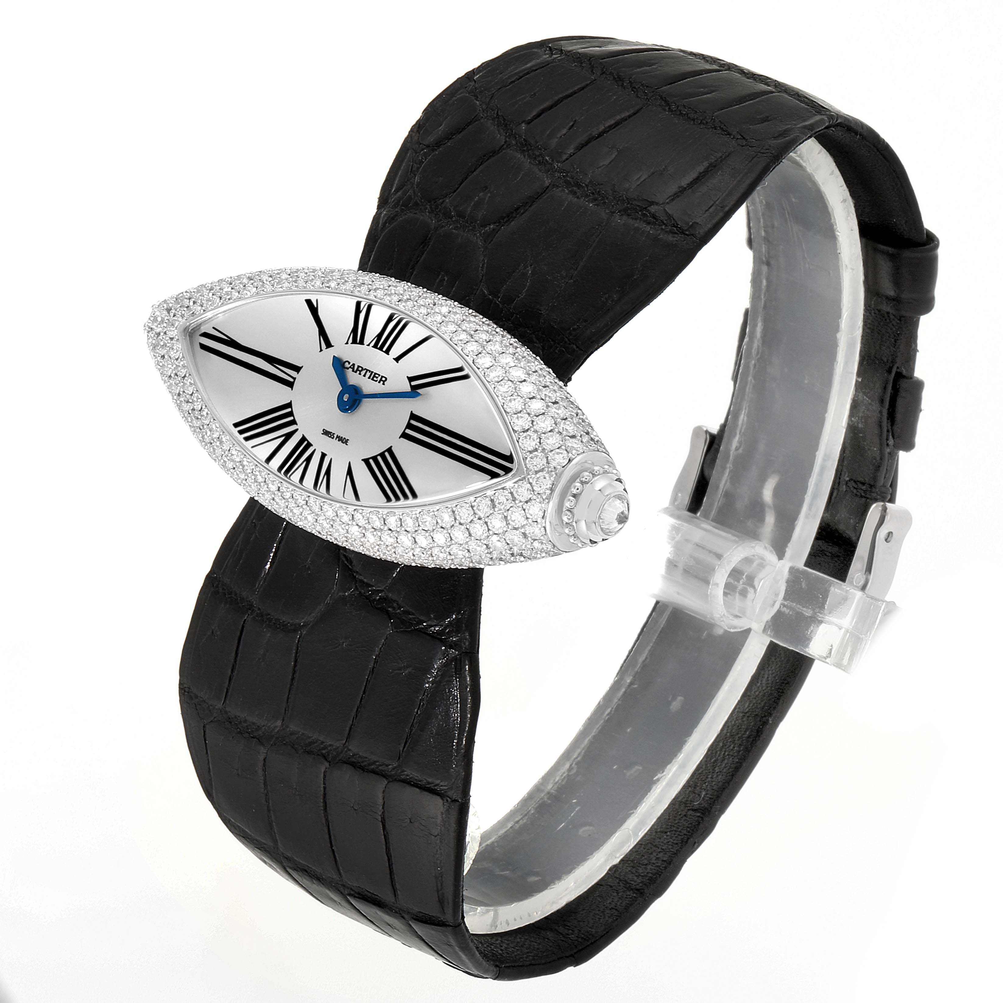 The image shows a Cartier Colisee 2908 Women
s White Gold Silver Dial 2908 Women
s White Gold Silver Dial watch from an angled side view, highlighting its black strap and diamond-encrusted oval dial.