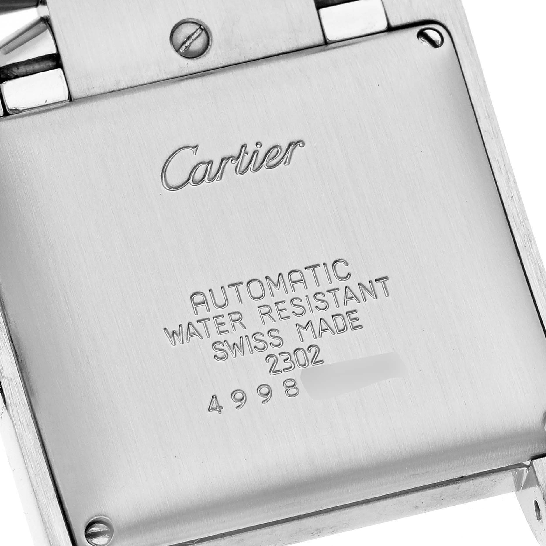 This image shows the back case of a Cartier Tank Francaise W51005Q4 Men
s Stainless Steel Silver Dial W51005Q4 Men
s Stainless Steel Silver Dial watch, highlighting its engraving and screws.