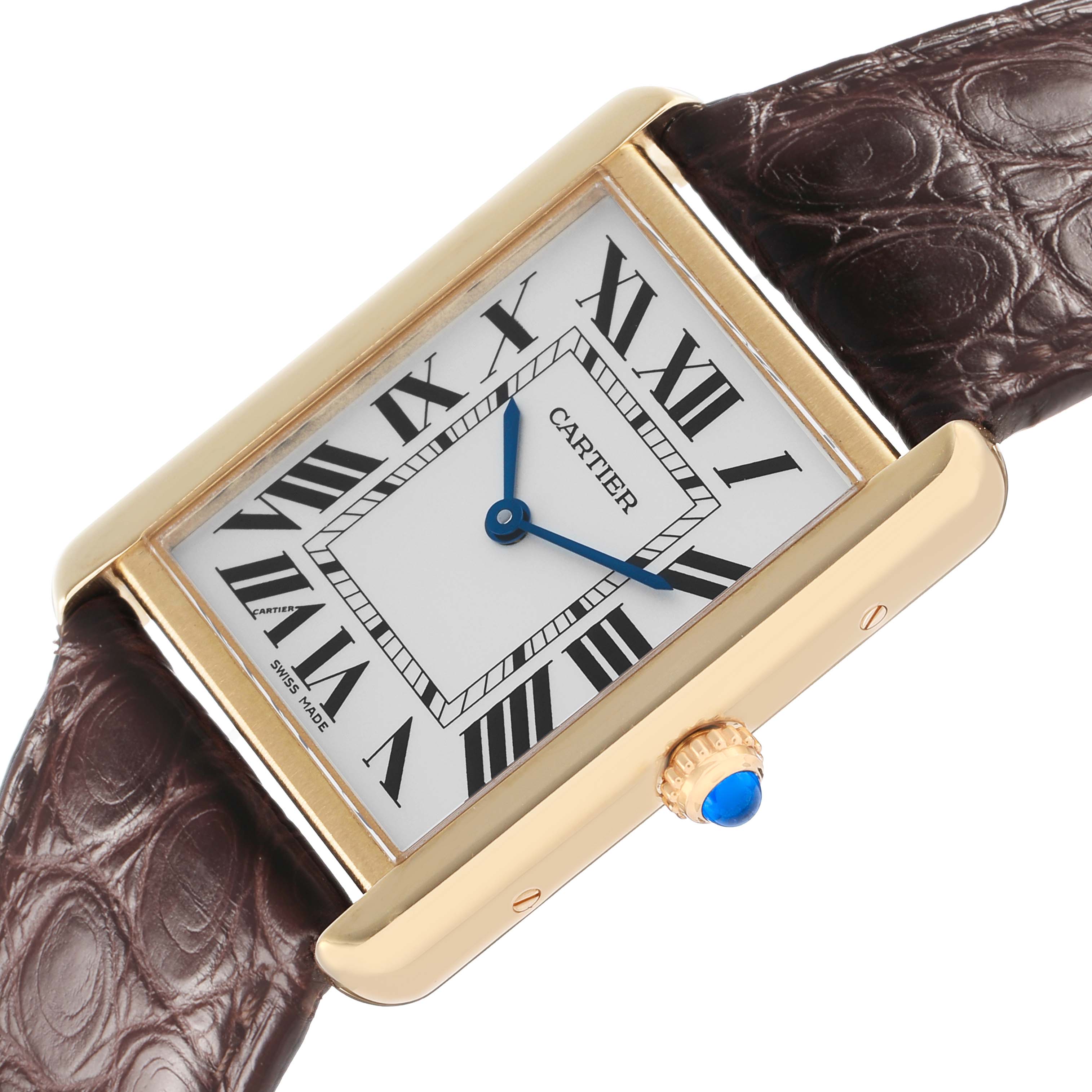 The Cartier Tank Solo W5200025 Men's Steel and Gold (two tone) Silver Dial watch is shown at an angle highlighting the face, crown, and leather strap.