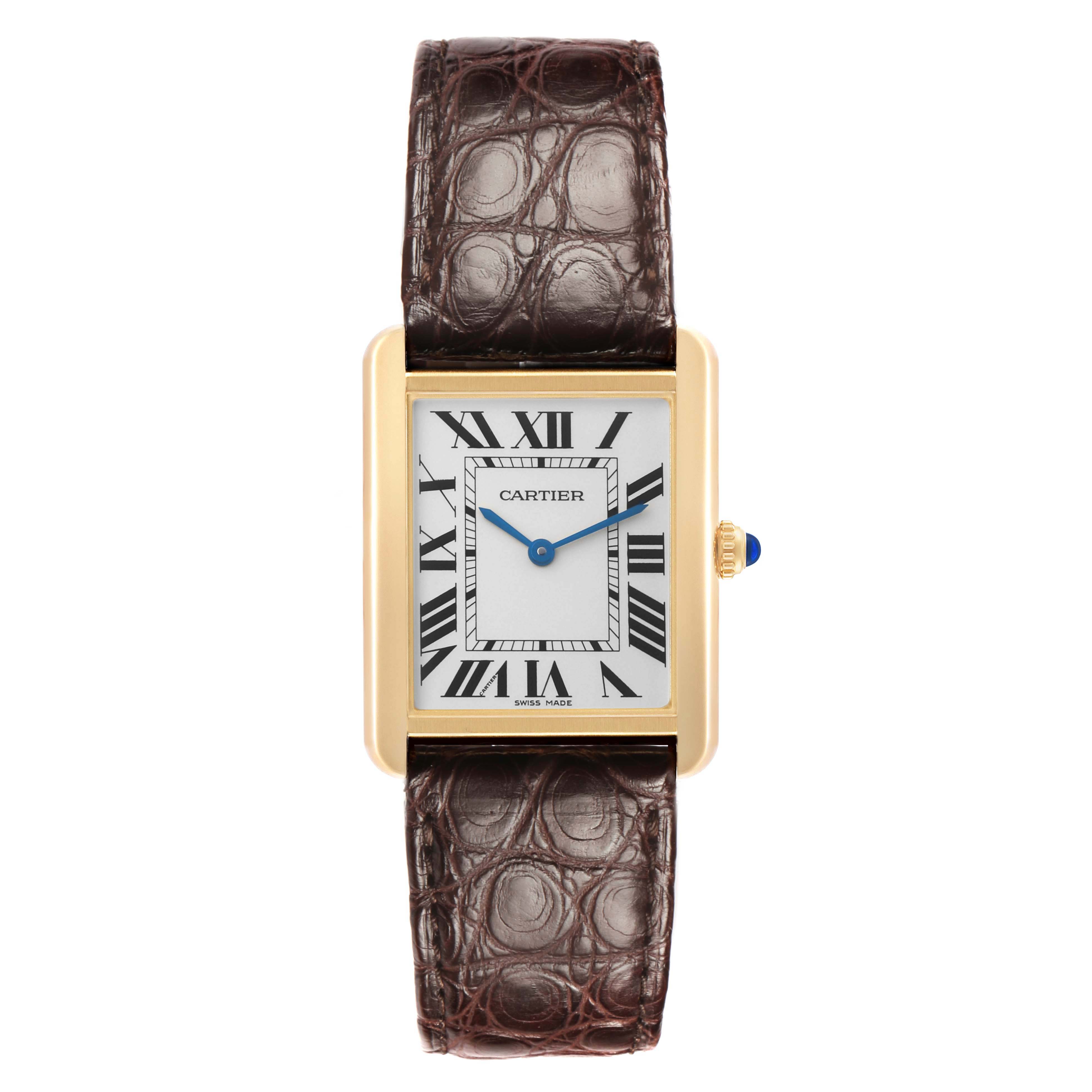 The Cartier Tank Solo W5200025 Men's Steel and Gold (two tone) Silver Dial watch is shown from a top-down angle, highlighting the rectangular dial, Roman numerals, and textured brown strap.