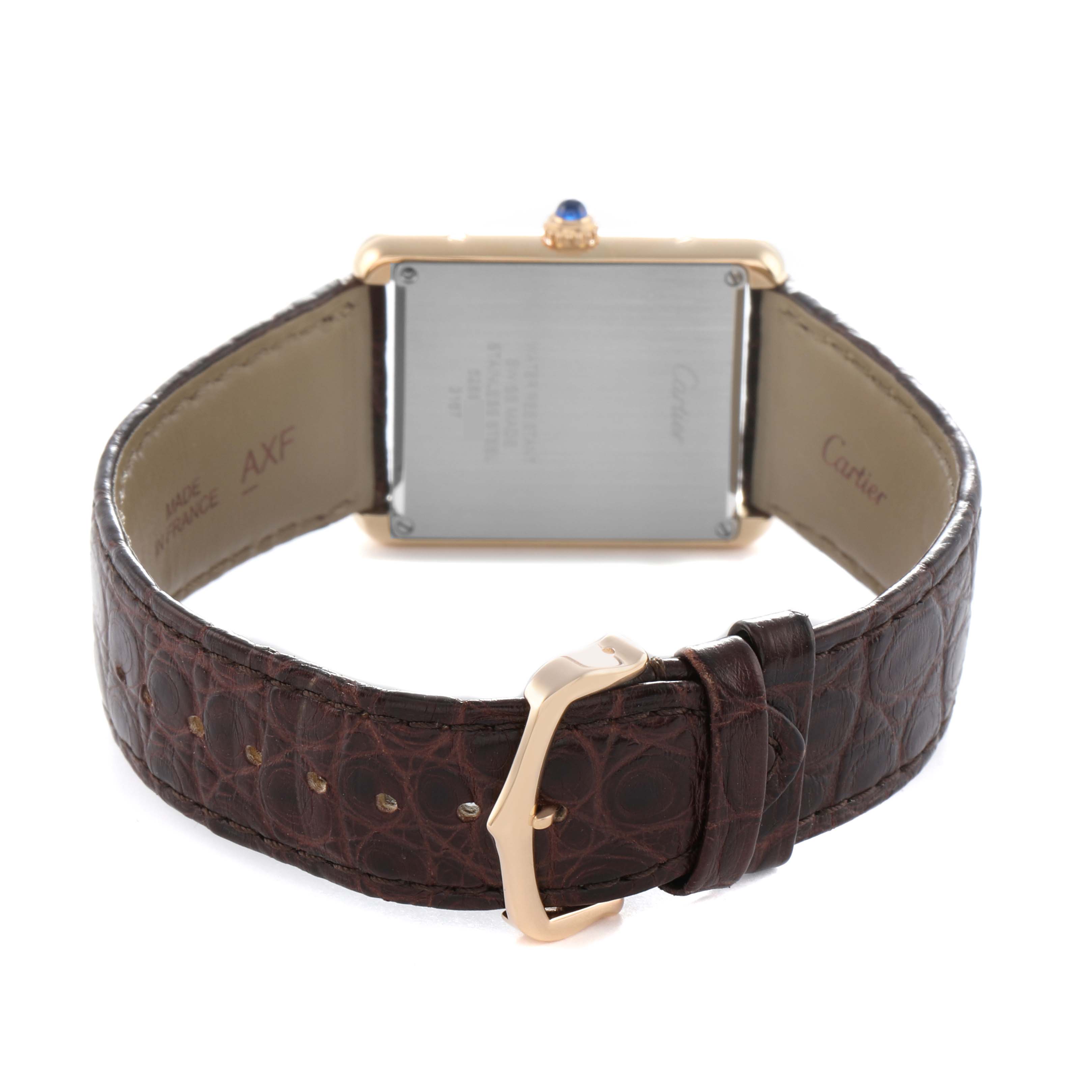 The image shows the back of the Cartier Tank Solo W5200025 Men's Steel and Gold (two tone) Silver Dial with its brown leather strap and buckle.