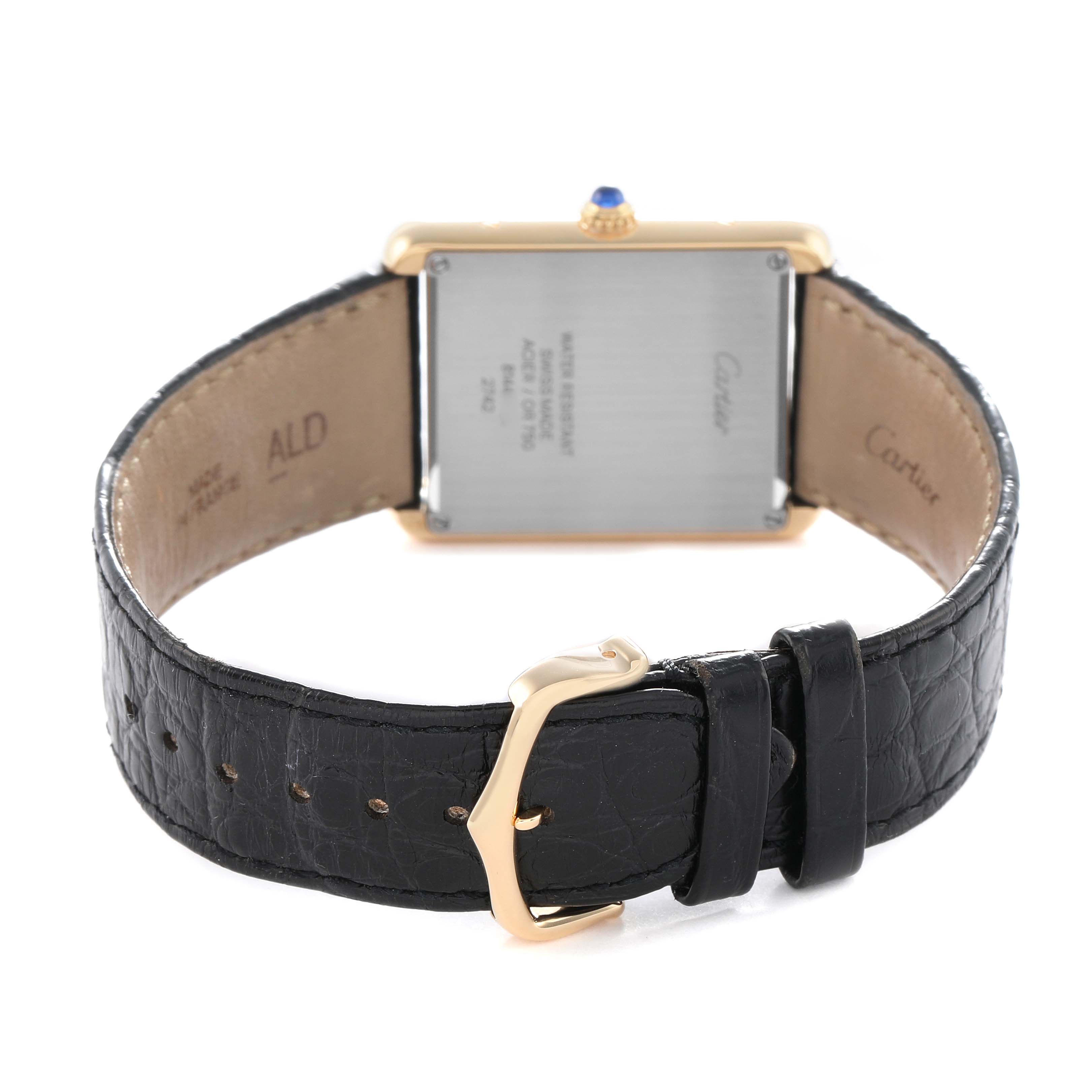 The image shows the back and side of the Cartier Tank Solo W1018855 Men's Steel and Gold (two tone) Silver Dial watch, displaying its case, buckle, and leather strap.