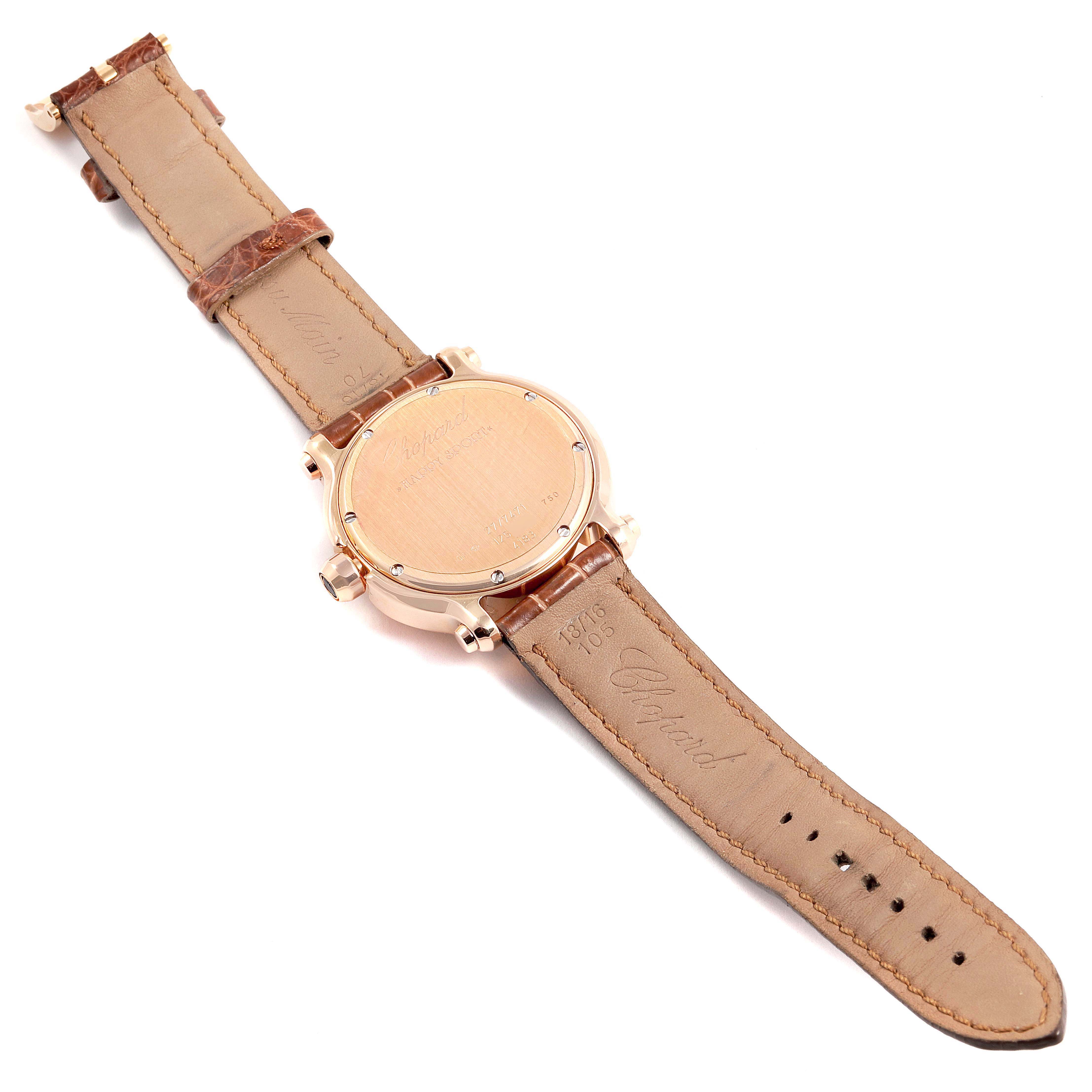 The image shows the back view of the Chopard 27/7471 Women's Rose Gold Mother of Pearl Dial 27/7471 Women's Rose Gold Mother of Pearl Dial Happy Sport 7 Floating Diamond Rose Gold Ladies Watch model 7471 with its leather strap.