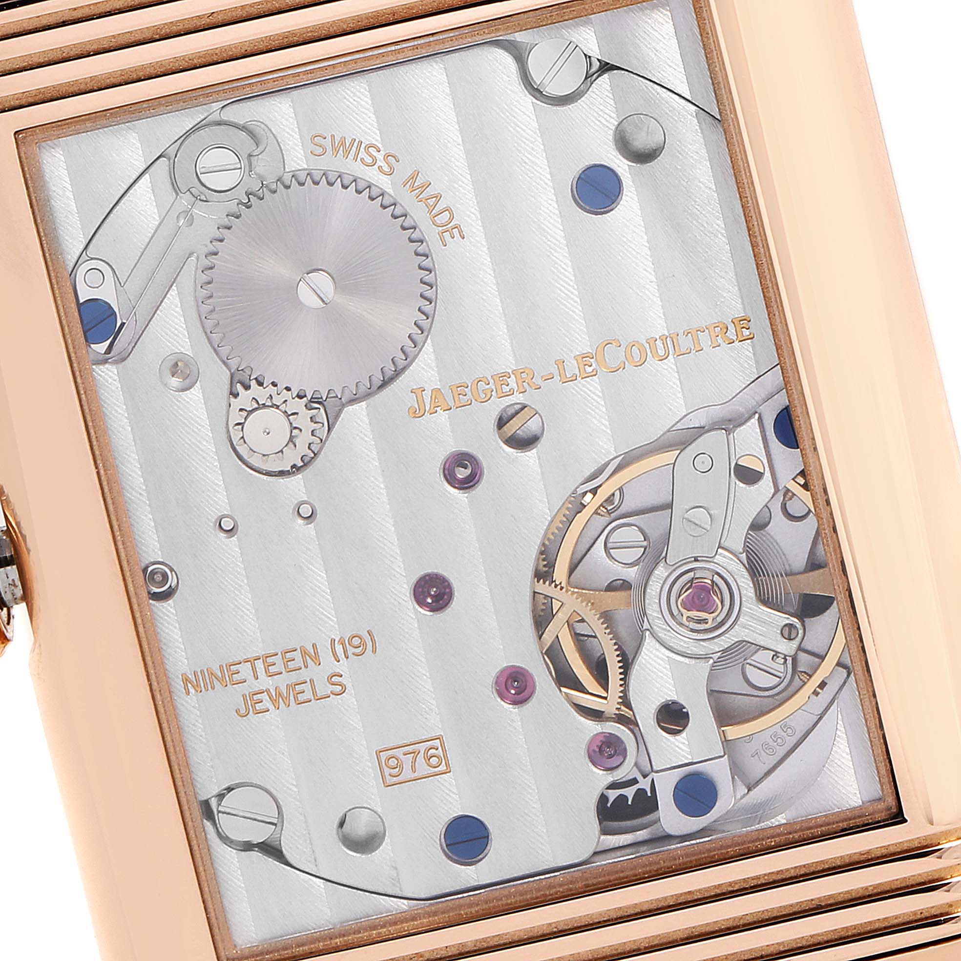 This image shows a close-up of the movement and internal mechanism of a Jaeger-LeCoultre Reverso watch.