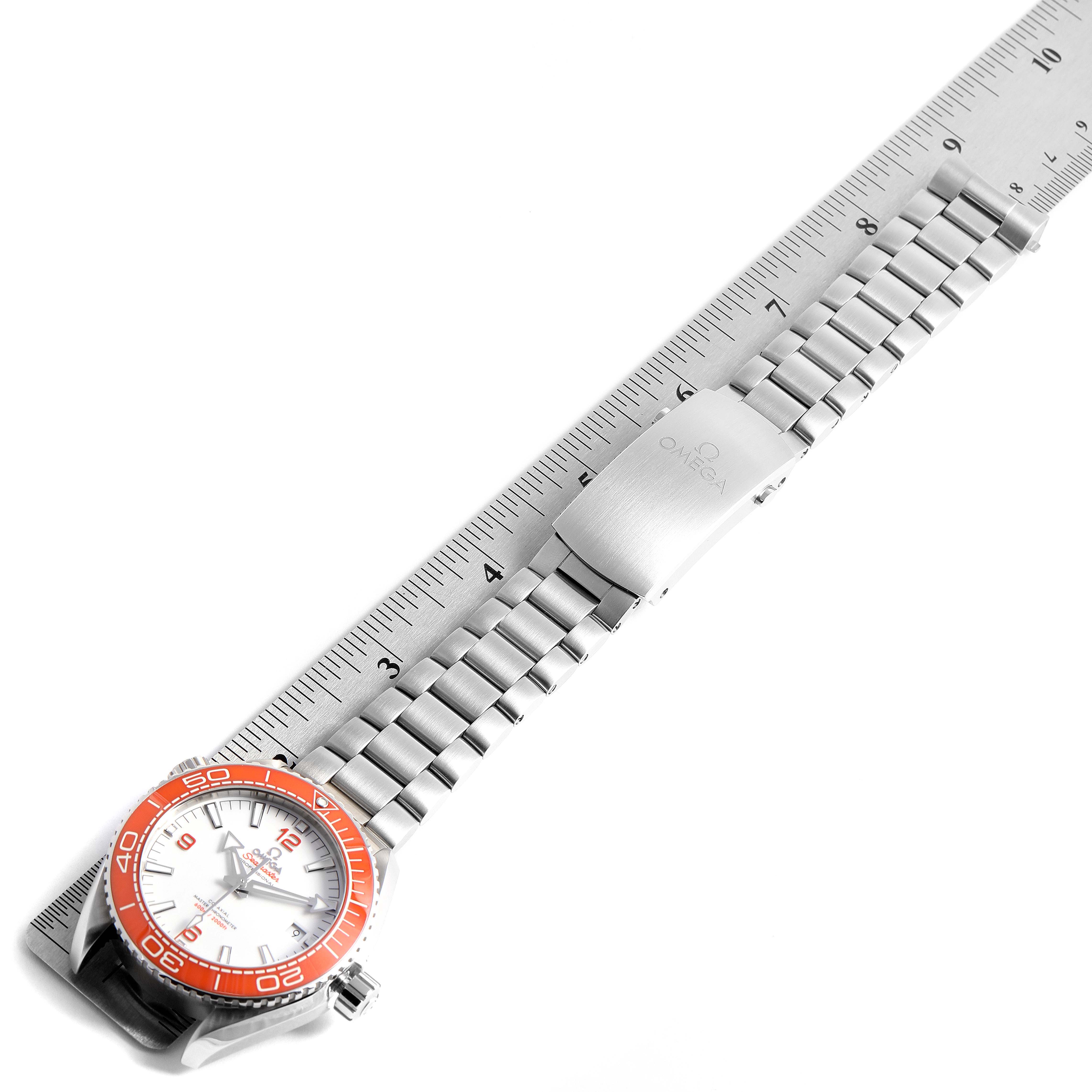 The Omega Planet Ocean 215.30.44.21.04.001 Men
s Stainless Steel White Dial 215.30.44.21.04.001 Men
s Stainless Steel White Dial watch is shown horizontally, displaying its entire bracelet, clasp, and case with an orange bezel.