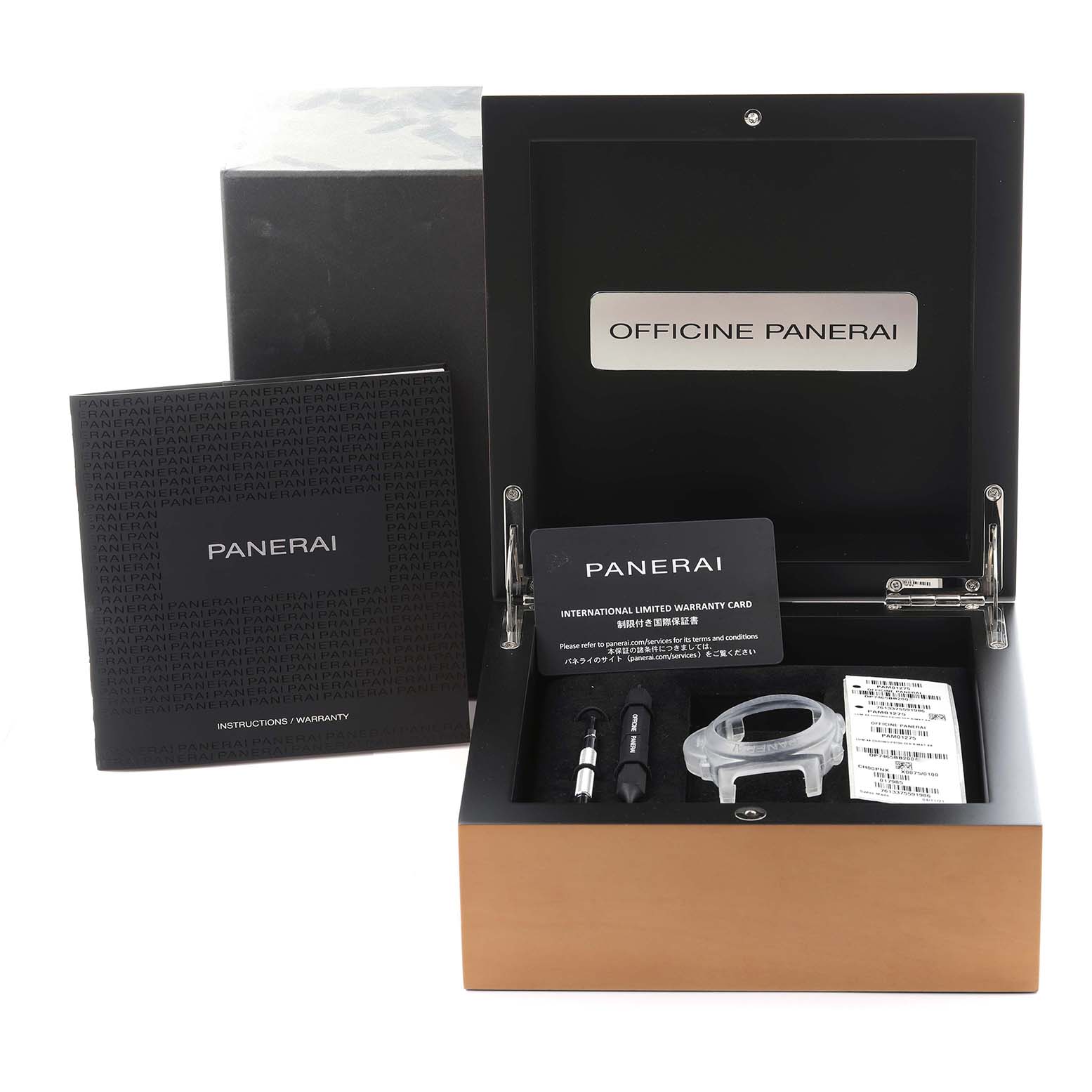 The image shows a Panerai Luminor PAM01275 Men's Ceramic Black Dial PAM01275 Men's Ceramic Black Dial watch box, with tools, a warranty card, and instruction manual displayed from a front angle.