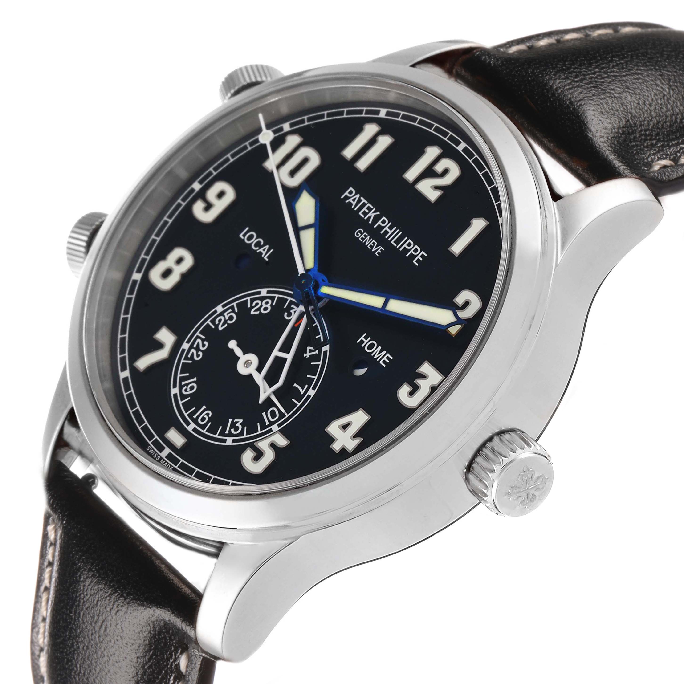 The Patek Philippe Calatrava 5524G Men's White Gold Blue Dial watch is shown at a three-quarter angle, highlighting the dial, crown, and leather strap.