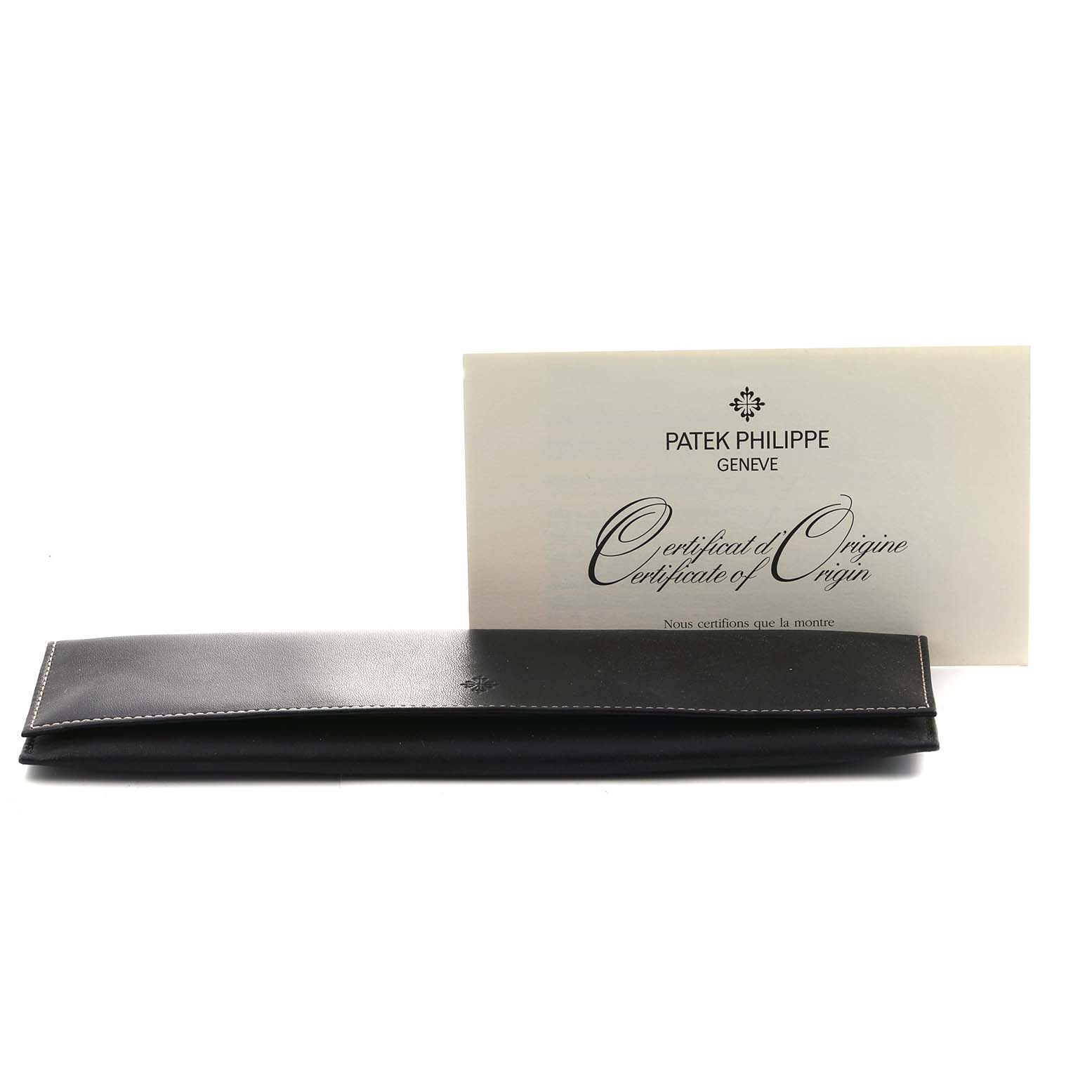 The image shows a black leather case and a certificate for a Patek Philippe Calatrava 5127 Men's Rose Gold Silver Dial watch.