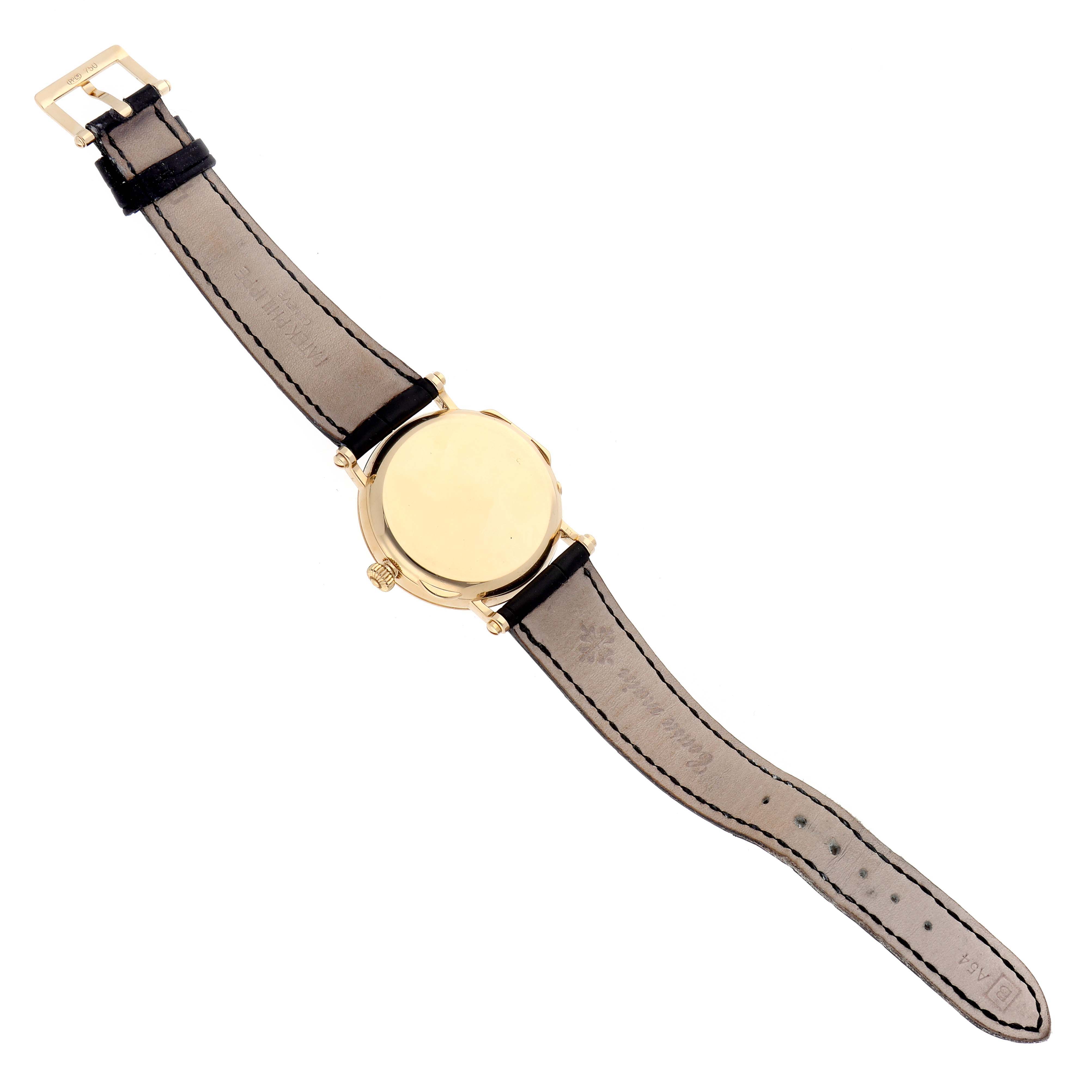 The image shows the back view of a Patek Philippe Calatrava 5015J-001 Men's Yellow Gold White Dial 5015J-001 Men's Yellow Gold White Dial watch, highlighting the strap and case back.