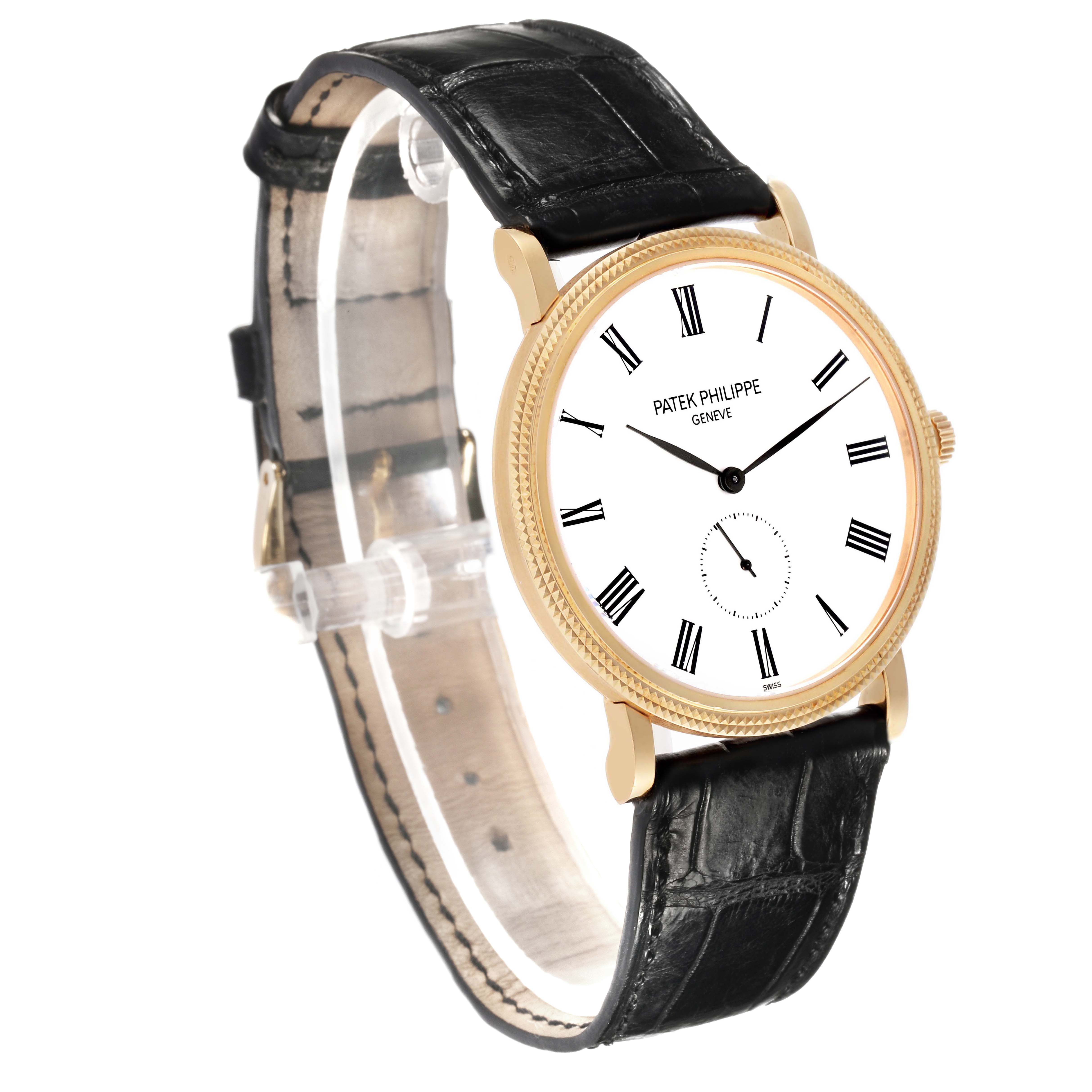 The Patek Philippe Calatrava 5119J-001 Men's Yellow Gold White Dial watch is shown at a slight angle, displaying the face, strap, bezel, and crown.