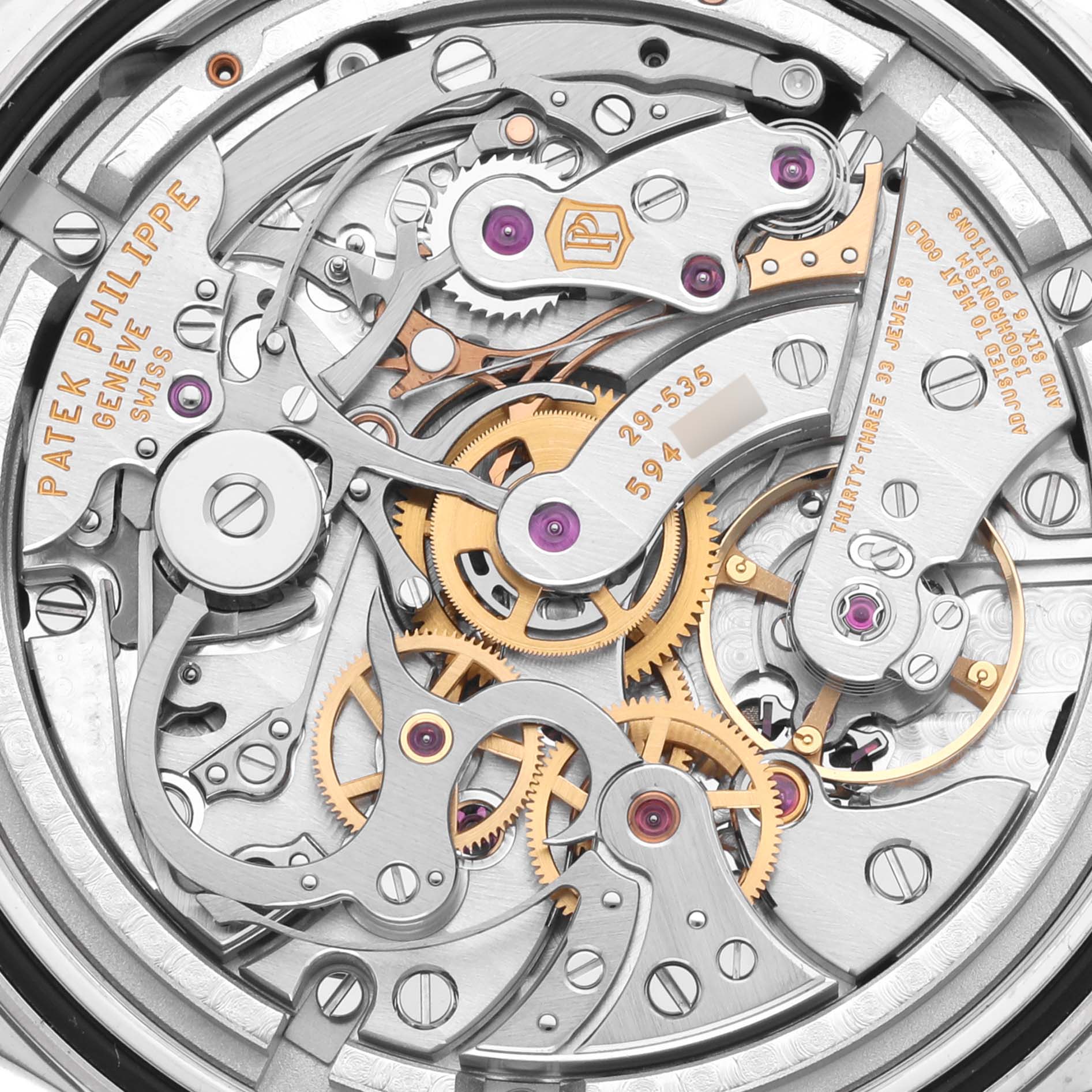 This image shows a close-up of the intricate movement details of a Patek Philippe Complications 5170G-010 Men's White Gold Black Dial 5170G-010 Men's White Gold Black Dial watch.