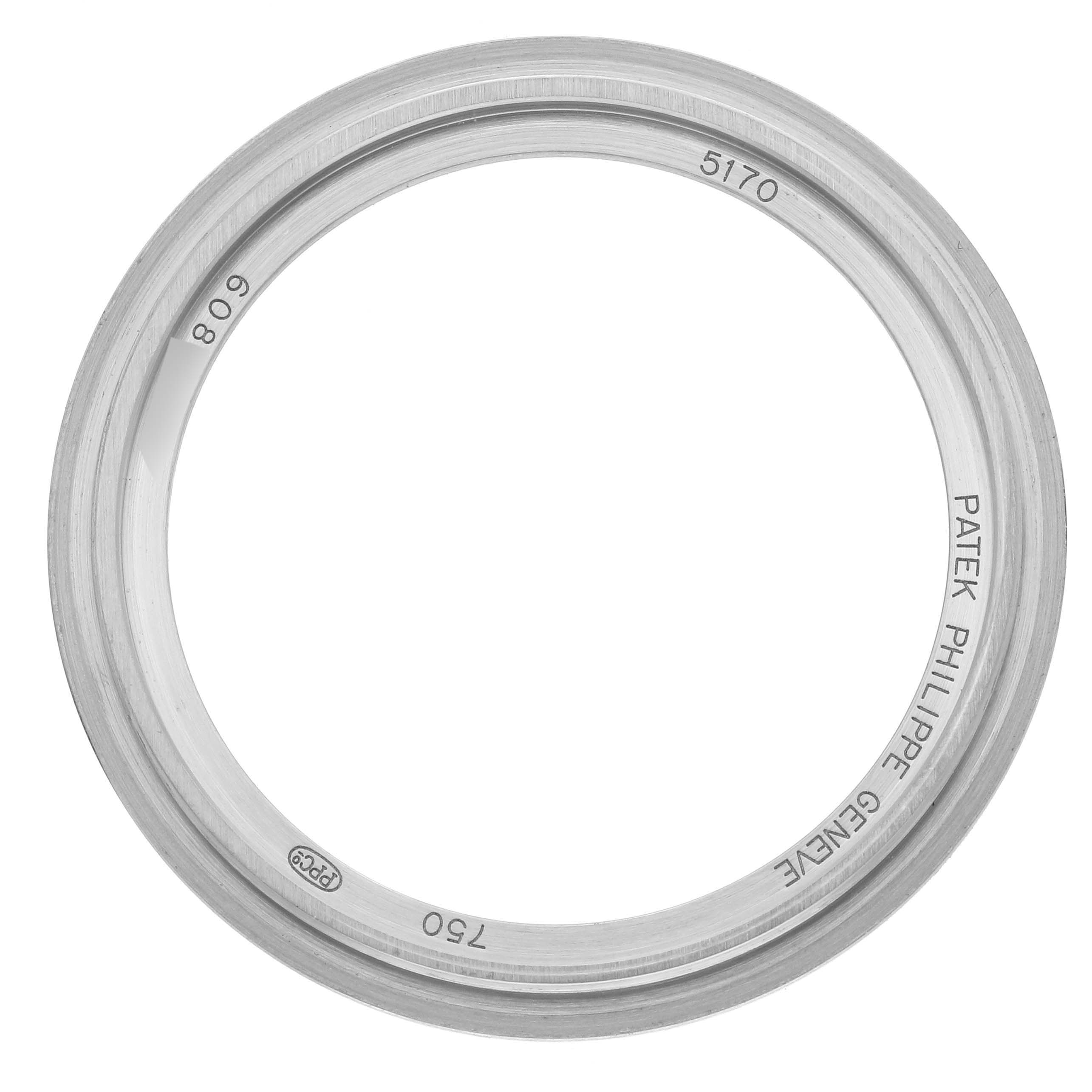 This image shows the bezel of a Patek Philippe Complications 5170G-010 Men's White Gold Black Dial 5170G-010 Men's White Gold Black Dial model, viewed from a top angle.