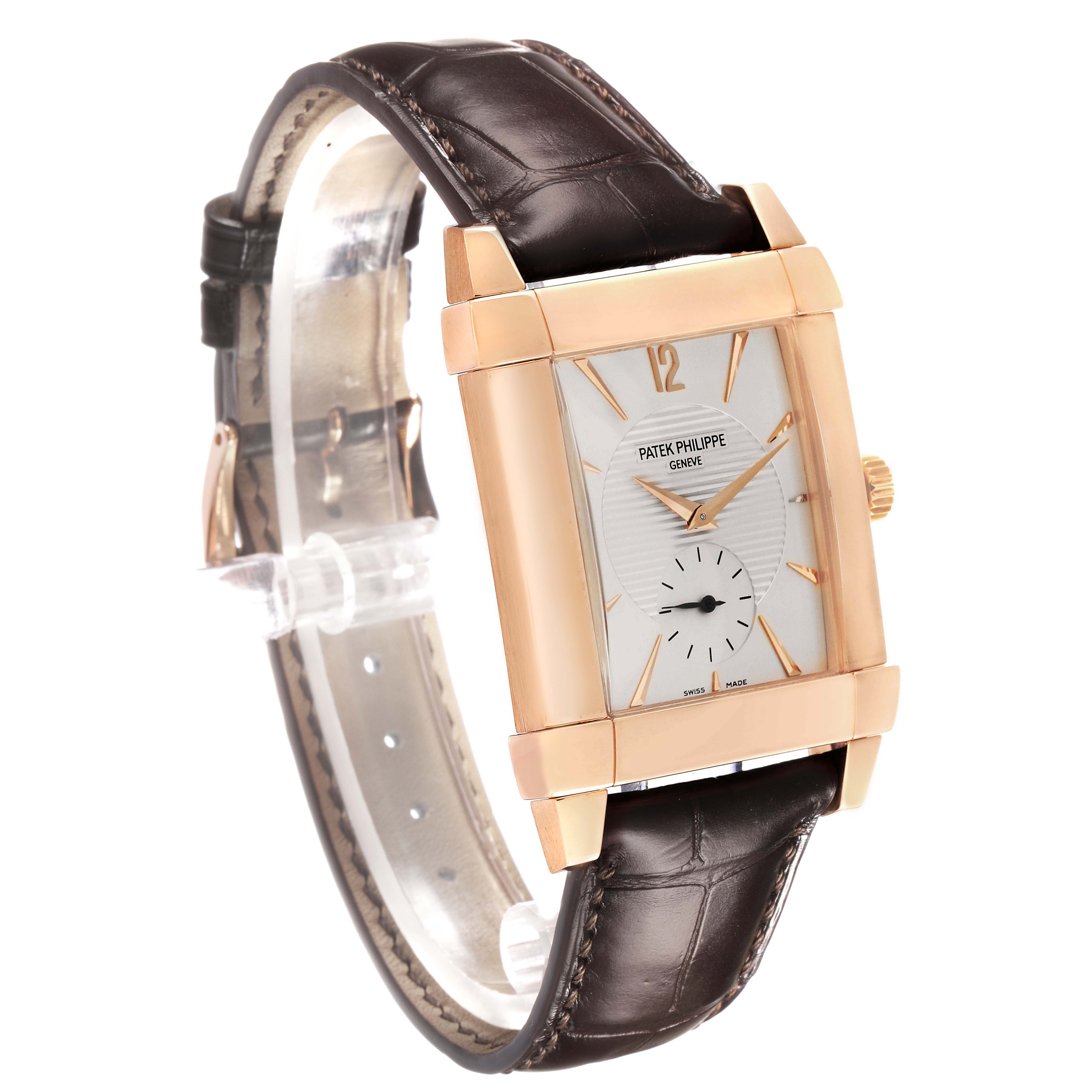 The Patek Philippe Gondolo 5111R-001 Men's Rose Gold Silver Dial watch is shown at a slight angle, highlighting its rectangular dial, gold case, and leather strap.