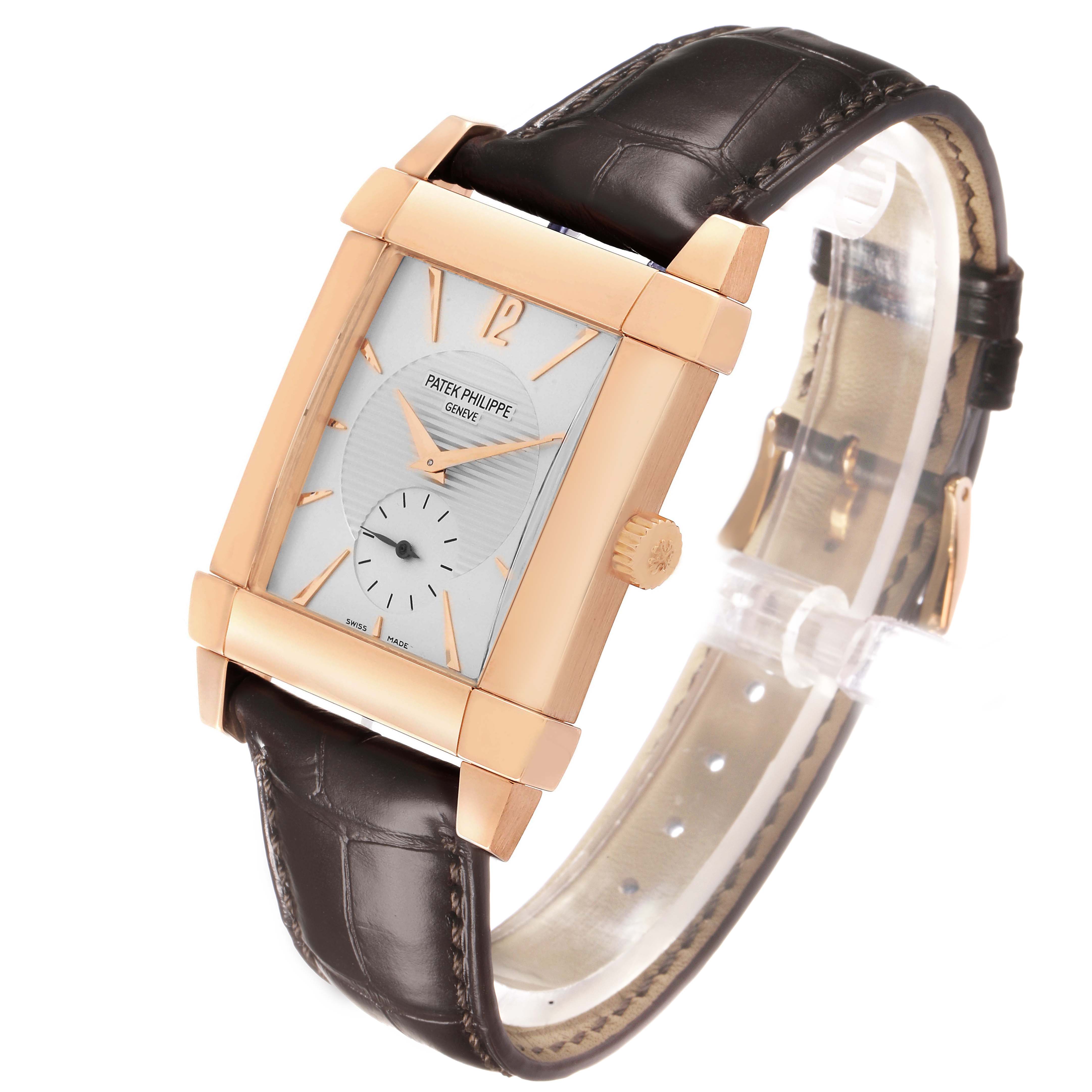 The Patek Philippe Gondolo 5111R-001 Men's Rose Gold Silver Dial watch is shown at a side-front angle, highlighting its rectangular face, crown, and leather strap.