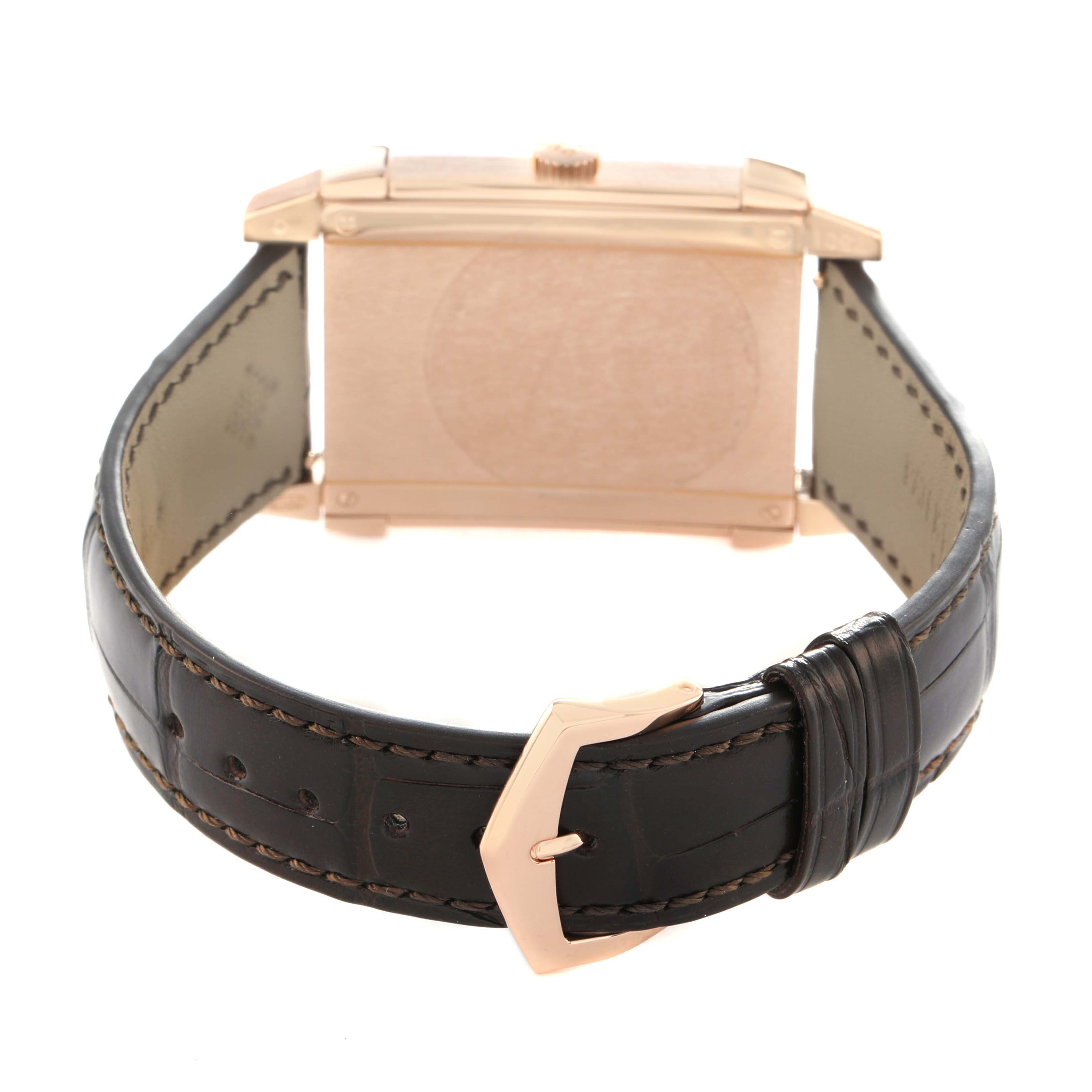 The image shows the back and side of the Patek Philippe Gondolo 5111R-001 Men's Rose Gold Silver Dial watch, featuring the case, crown, and leather strap with the clasp.