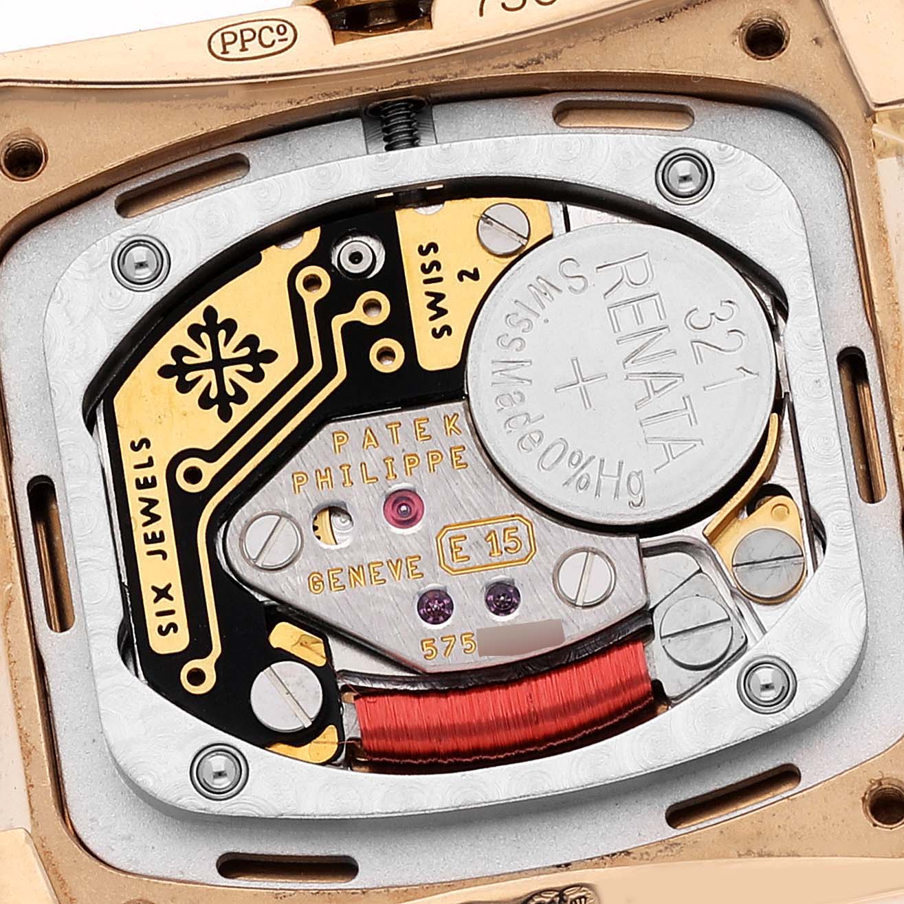 This image shows the movement and internal parts of a Patek Philippe Twenty-4 4908/11R Women's Rose Gold Brown Dial 4908/11R Women's Rose Gold Brown Dial watch from a close-up angle.