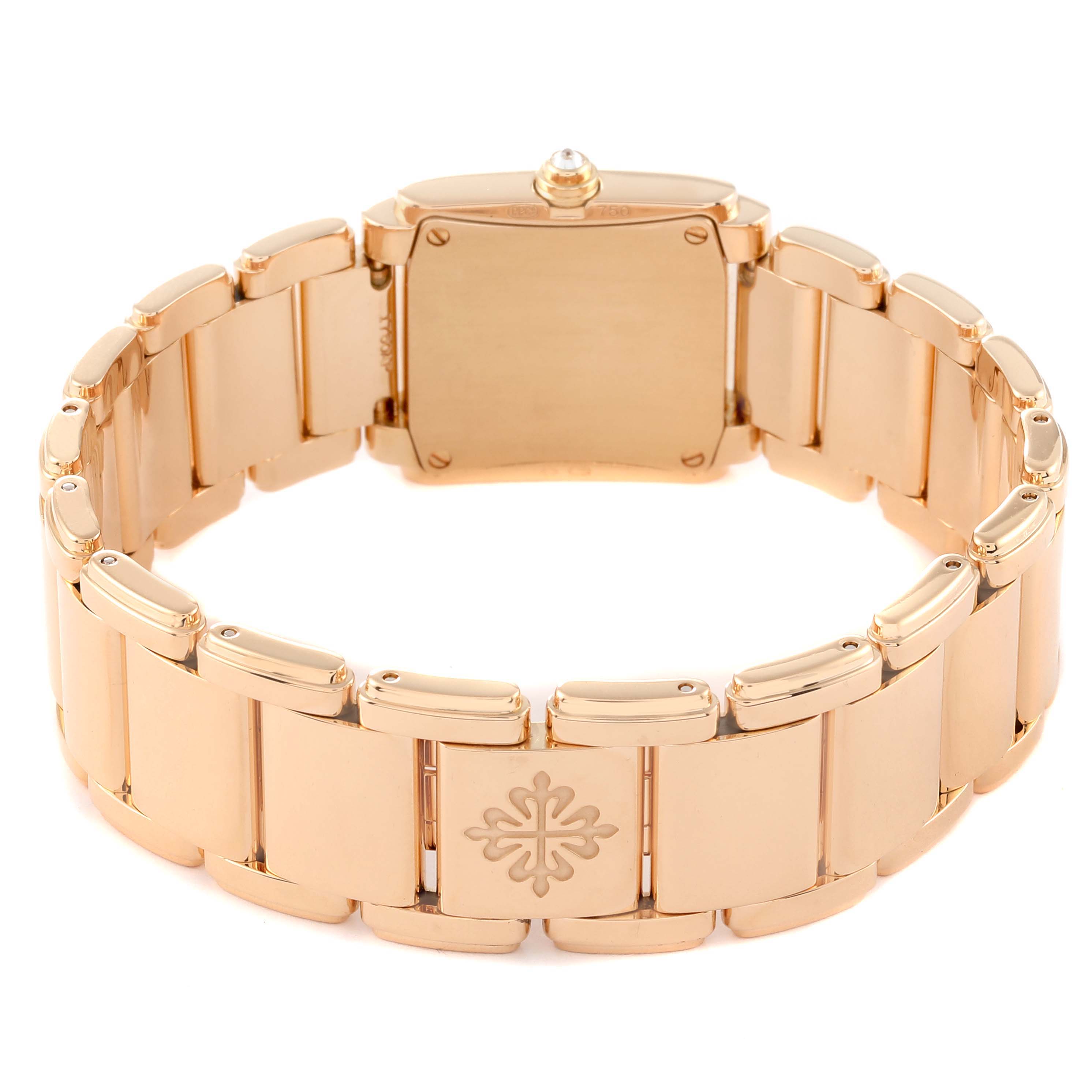 This image shows the back view of the Patek Philippe Twenty-4 4908/11R Women's Rose Gold Brown Dial 4908/11R Women's Rose Gold Brown Dial watch, highlighting its gold bracelet and clasp.