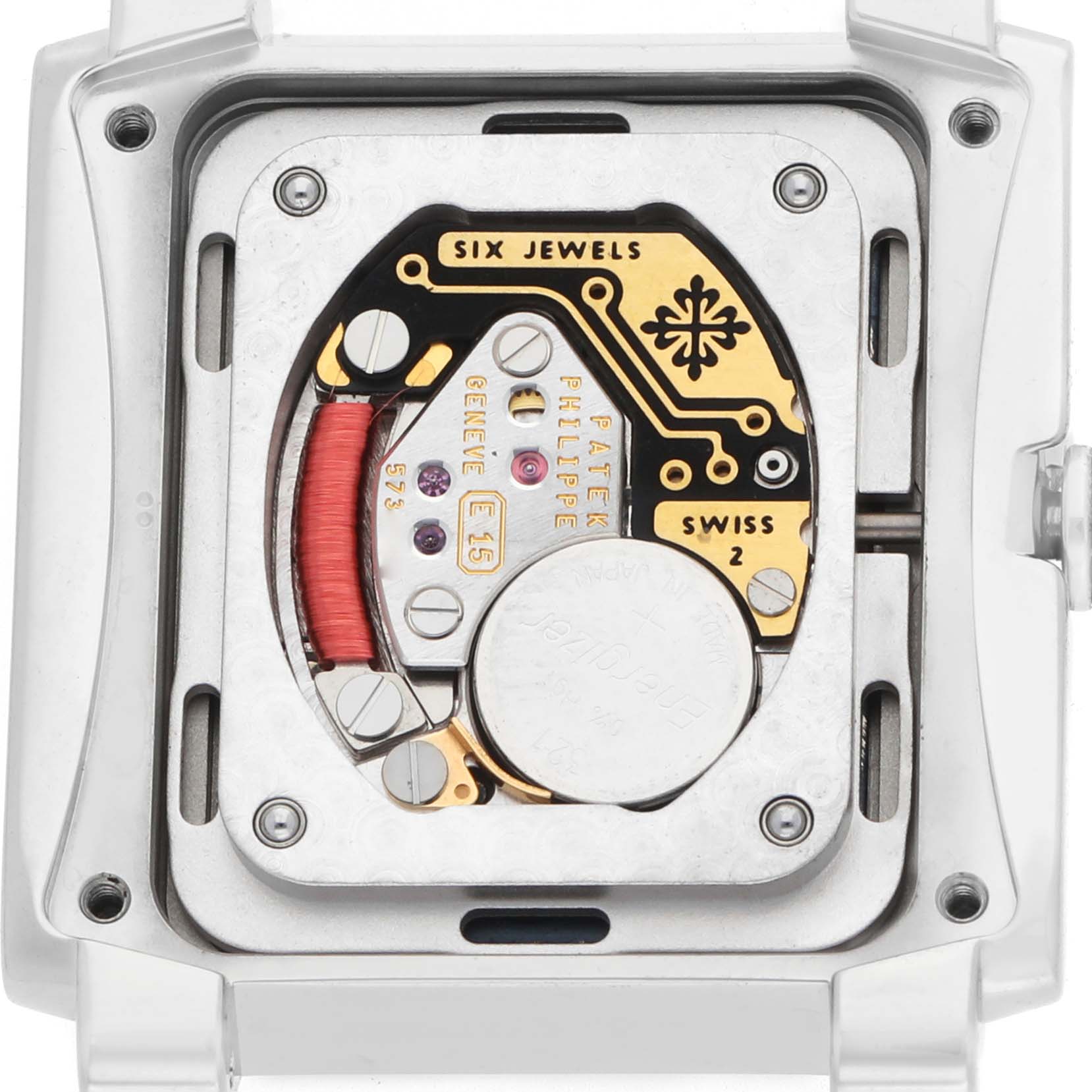 The image shows the back view of a Patek Philippe Twenty-4 4910/10A Women's Stainless Steel Blue Dial watch, highlighting its internal movement and components.