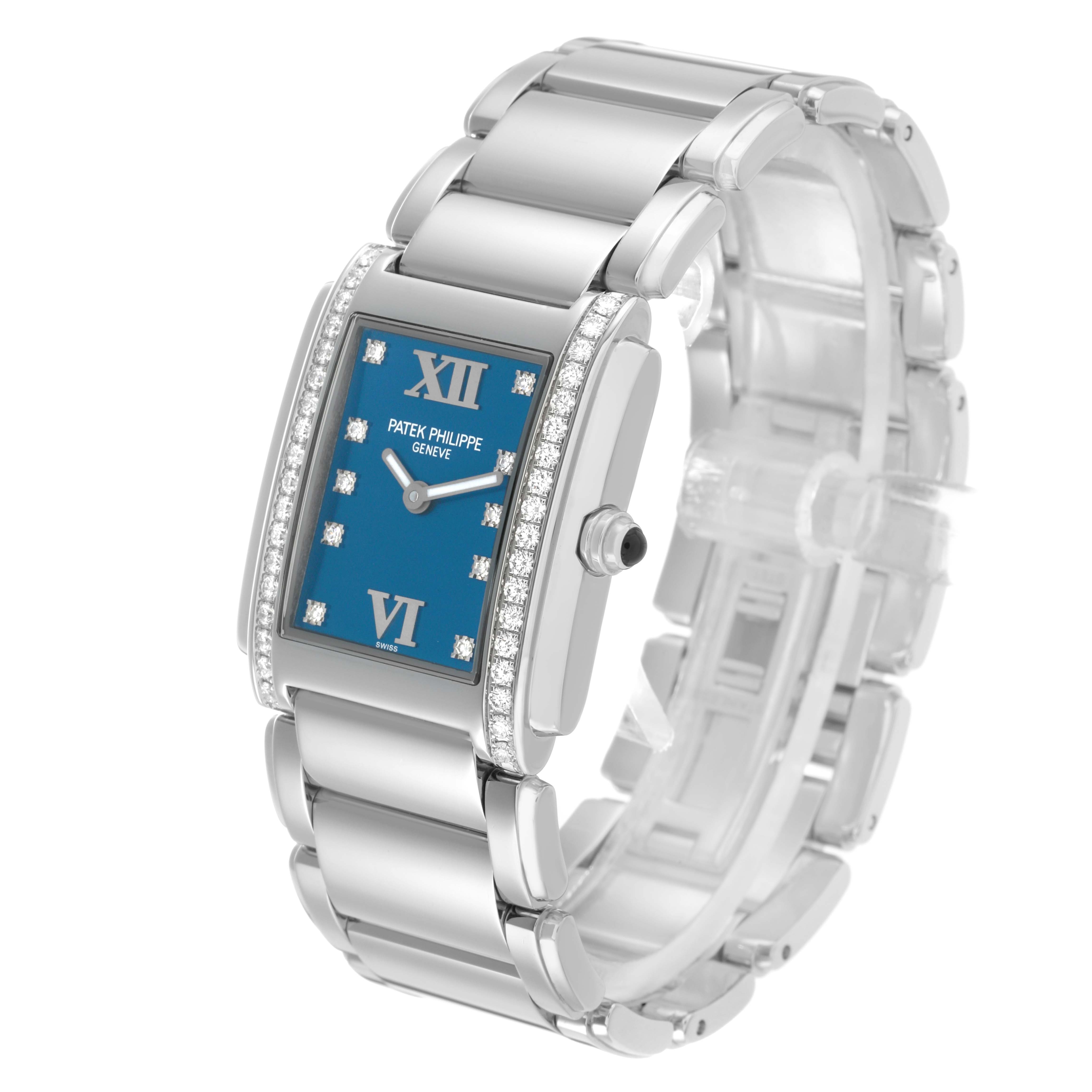 The Patek Philippe Twenty-4 4910/10A Women's Stainless Steel Blue Dial watch is shown at a three-quarter angle, displaying the blue dial, diamond-set bezel, and metal bracelet.