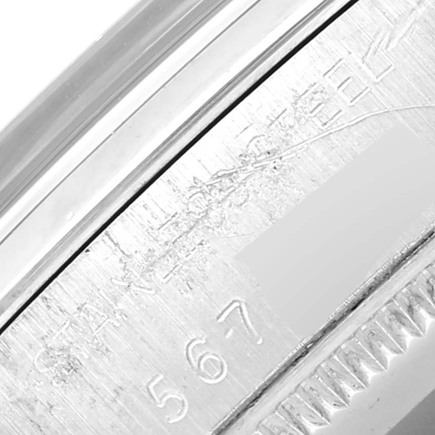 This close-up image of the Vintage Collection model by Rolex shows part of the watch's engraved case back and serial number.