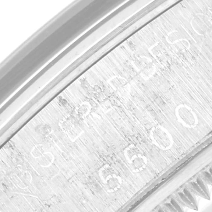 This image shows a close-up of the serial number engraving on the caseback rim of a Rolex Vintage Collection 5500 Men's Stainless Steel Silver Dial 5500 Men's Stainless Steel Silver Dial model watch.