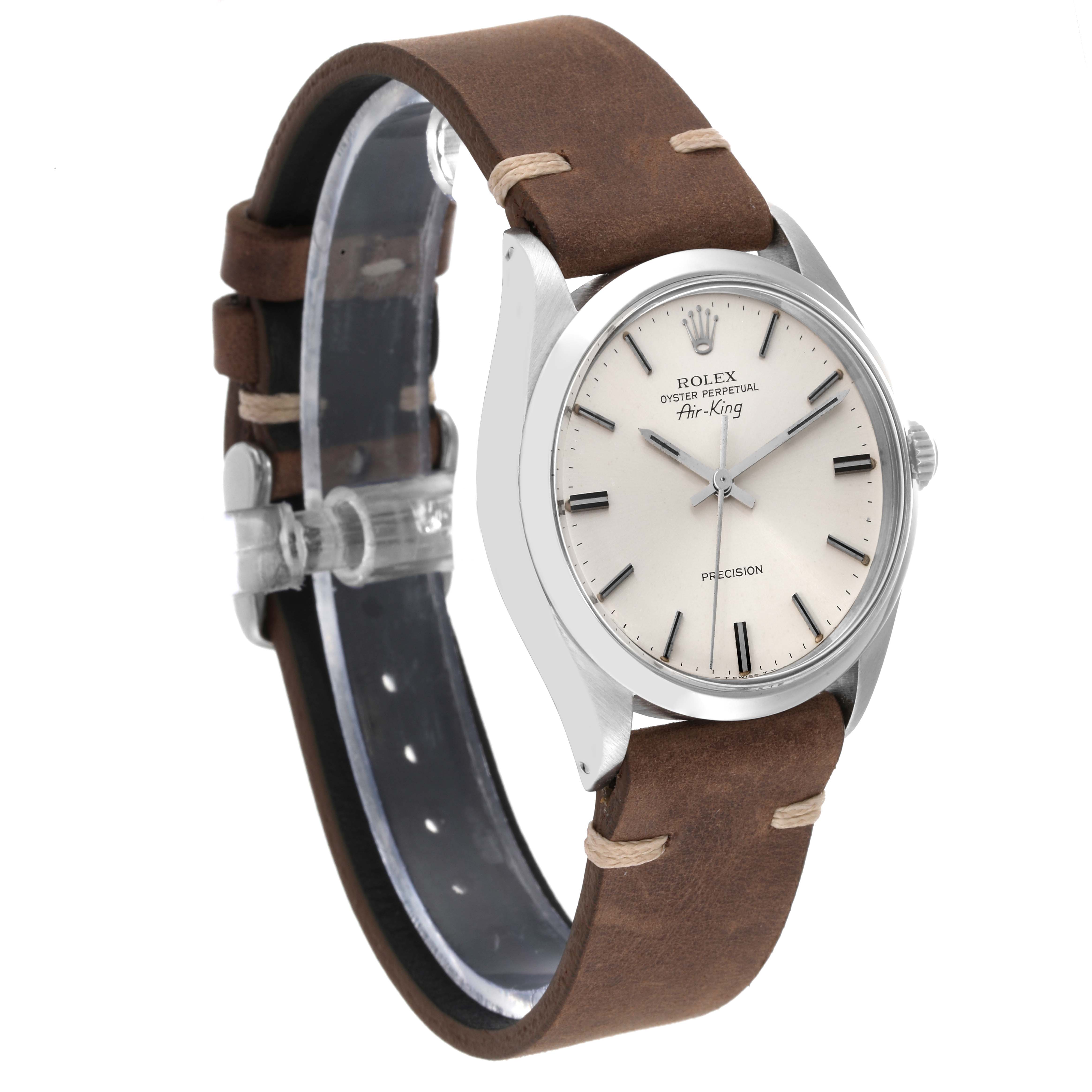 The image shows a Rolex Vintage Collection 5500 Men's Stainless Steel Silver Dial 5500 Men's Stainless Steel Silver Dial model watch at a three-quarter angle, highlighting its brown leather strap and silver dial.