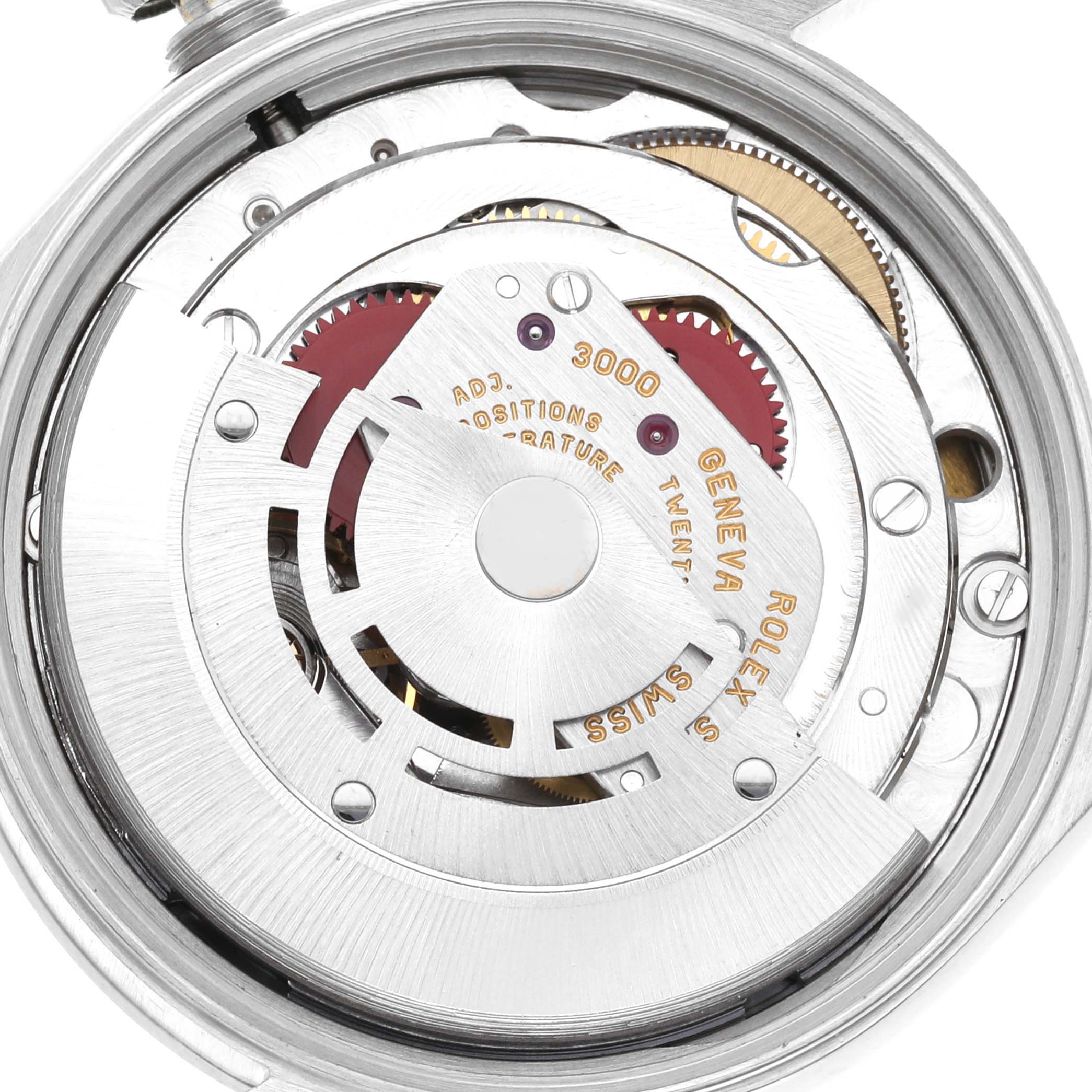 The image shows the inner mechanical movement of the Rolex Air-King 14000 Men's Stainless Steel White Dial 14000 Men's Stainless Steel White Dial watch, focusing on its intricate gears and components.