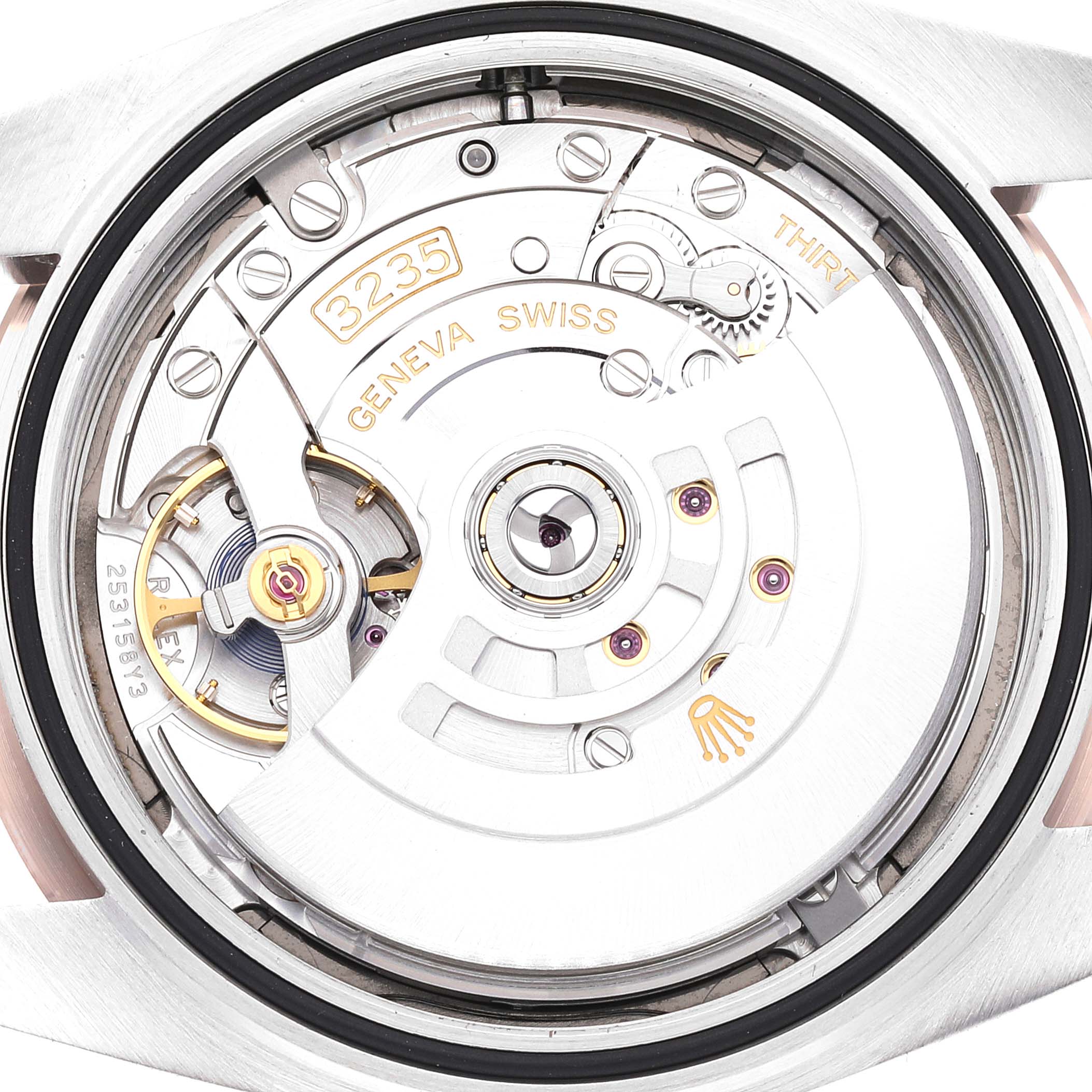 This is a close-up view of the movement mechanism of the Rolex Datejust 41 126331 Men
s Steel and Gold (two tone) Grey Dial 126331 Men
s Steel and Gold (two tone) Grey Dial watch, showcasing the intricate details and parts.