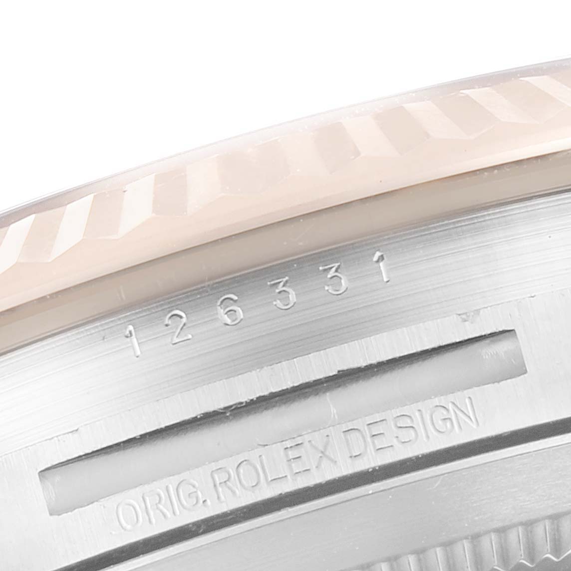This close-up angle shows part of the bezel and serial number engraving on the case of a Rolex Datejust 41 126331 Men
s Steel and Gold (two tone) Grey Dial 126331 Men
s Steel and Gold (two tone) Grey Dial watch.