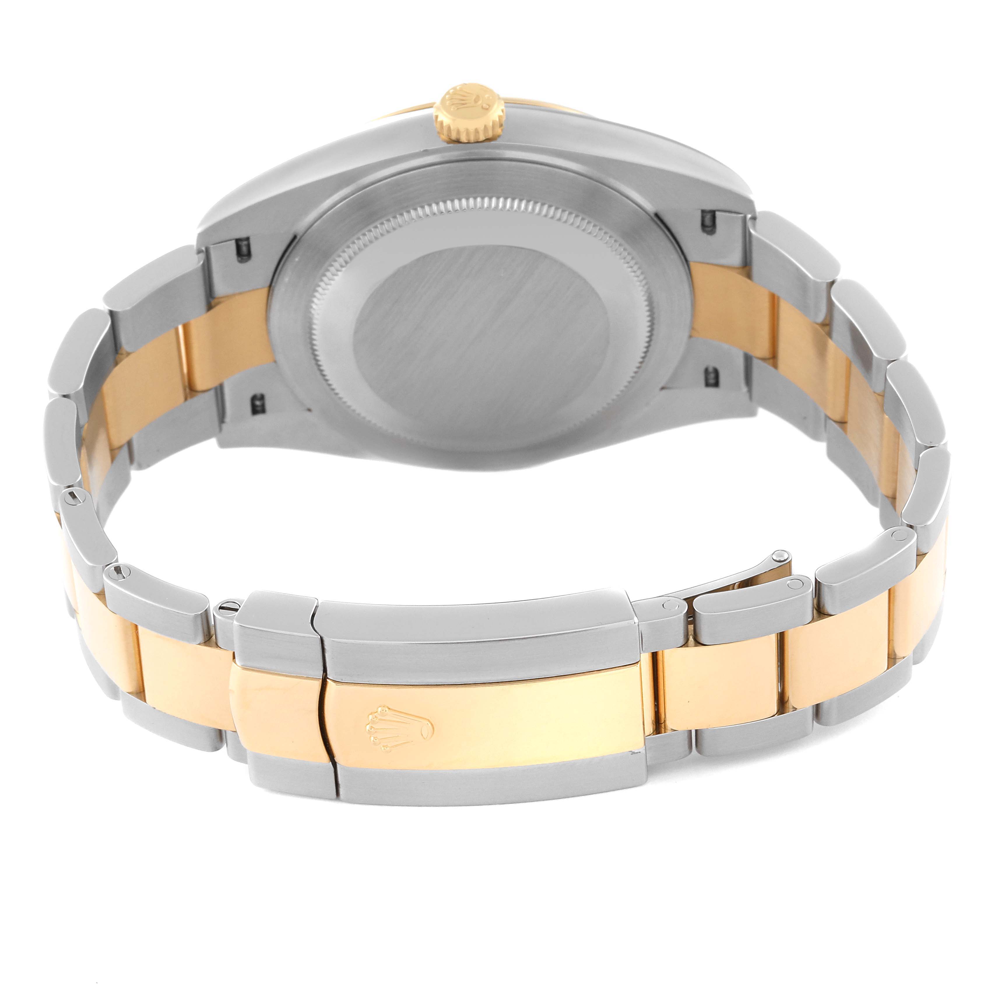 The image shows the back view of a Rolex Datejust 41 126333 Men's Steel and Gold (two tone) Champagne Dial 126333 Men's Steel and Gold (two tone) Champagne Dial model watch, highlighting its clasp, band, and case back.
