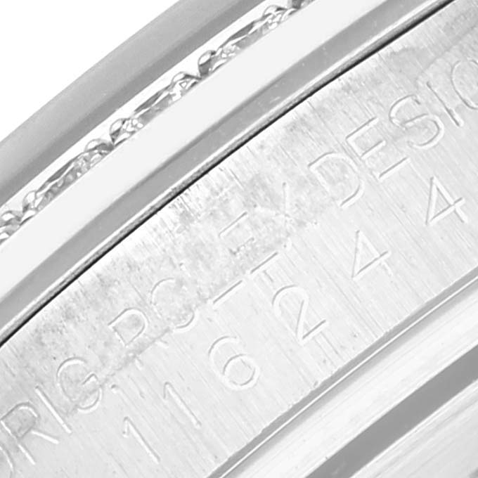 This close-up image shows the engraved caseback of a Rolex Datejust 116244 Men's Stainless Steel Silver Dial 116244 Men's Stainless Steel Silver Dial watch, highlighting part of the model number.