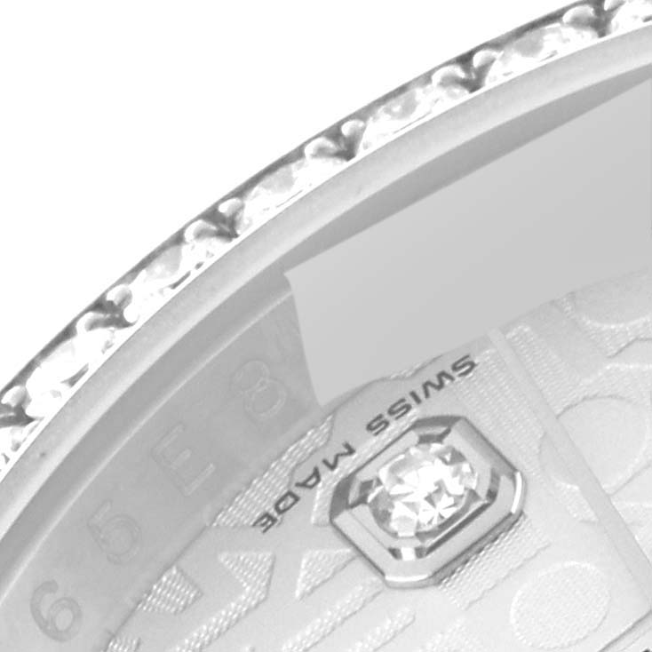 The close-up image shows a partial view of the bezel and dial of a Rolex Datejust 116244 Men's Stainless Steel Silver Dial 116244 Men's Stainless Steel Silver Dial watch.