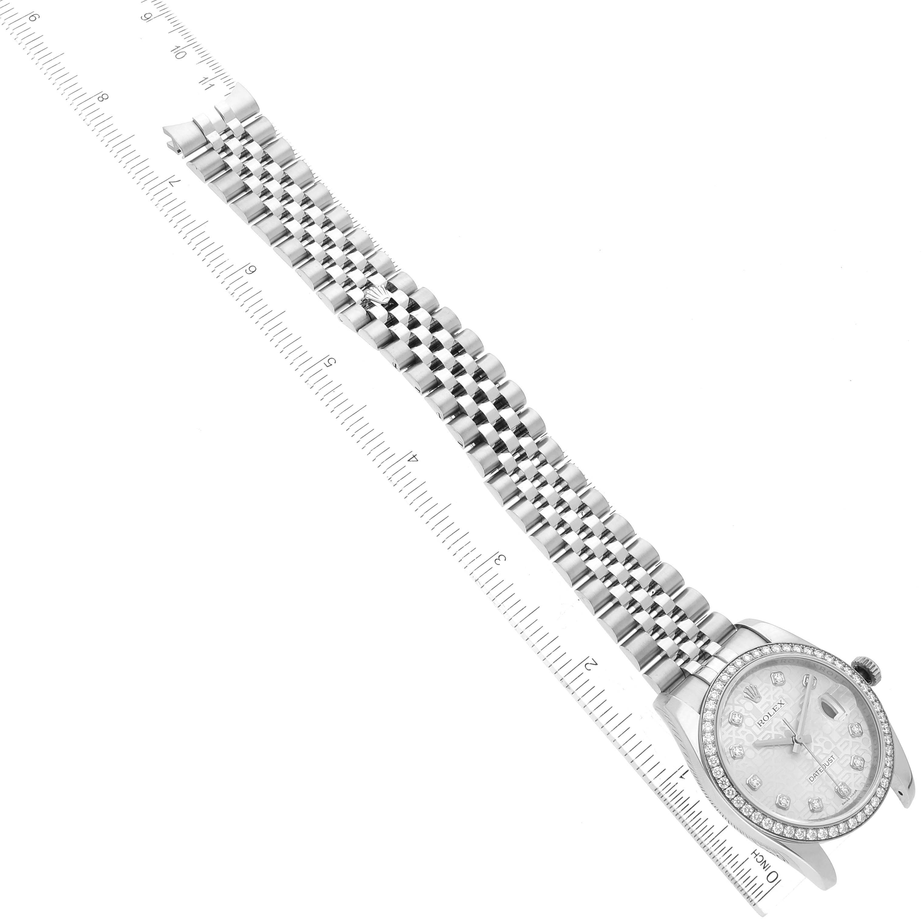 The image shows a Rolex Datejust 116244 Men's Stainless Steel Silver Dial 116244 Men's Stainless Steel Silver Dial watch, viewed from a top-down angle, displaying the dial, bezel, and full bracelet against a ruler for scale.
