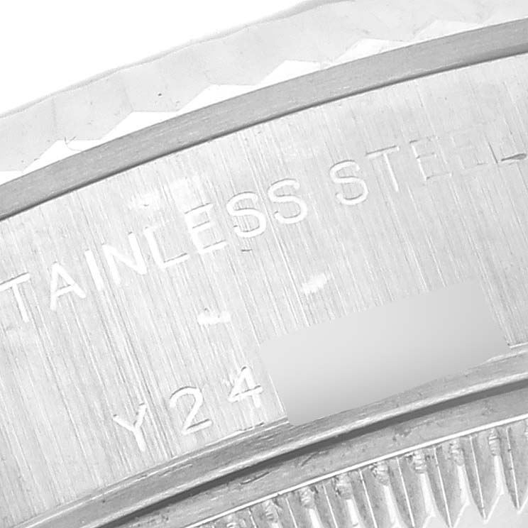The image shows a close-up of the case back of a Rolex Datejust 79174 Women's Stainless Steel Silver Dial 79174 Women's Stainless Steel Silver Dial, highlighting the stainless steel engraving.