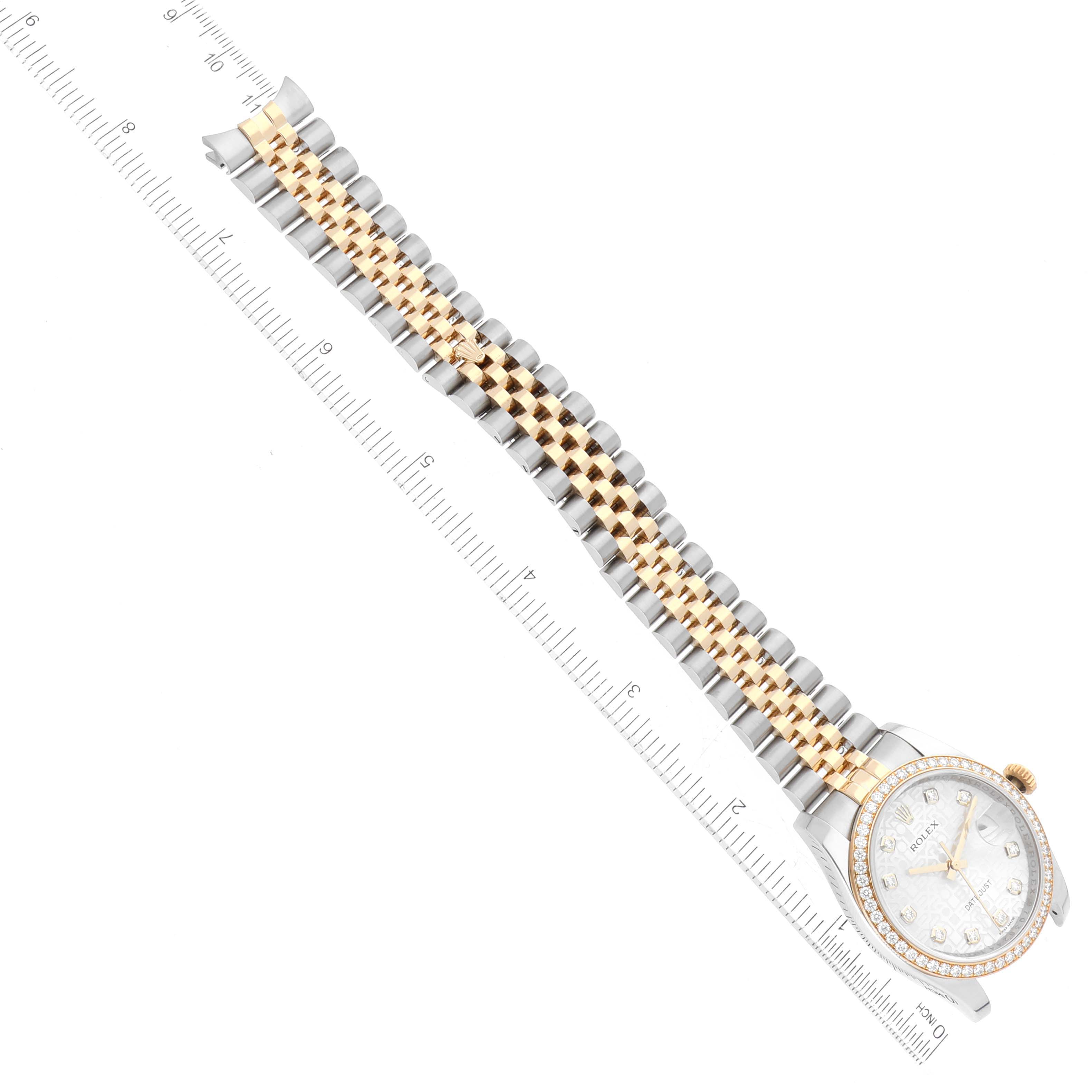 The image shows a Rolex Datejust 116243 Men's Stainless Steel Silver Dial 116243 Men's Stainless Steel Silver Dial watch laid flat with the bracelet fully extended and a ruler underneath for reference.