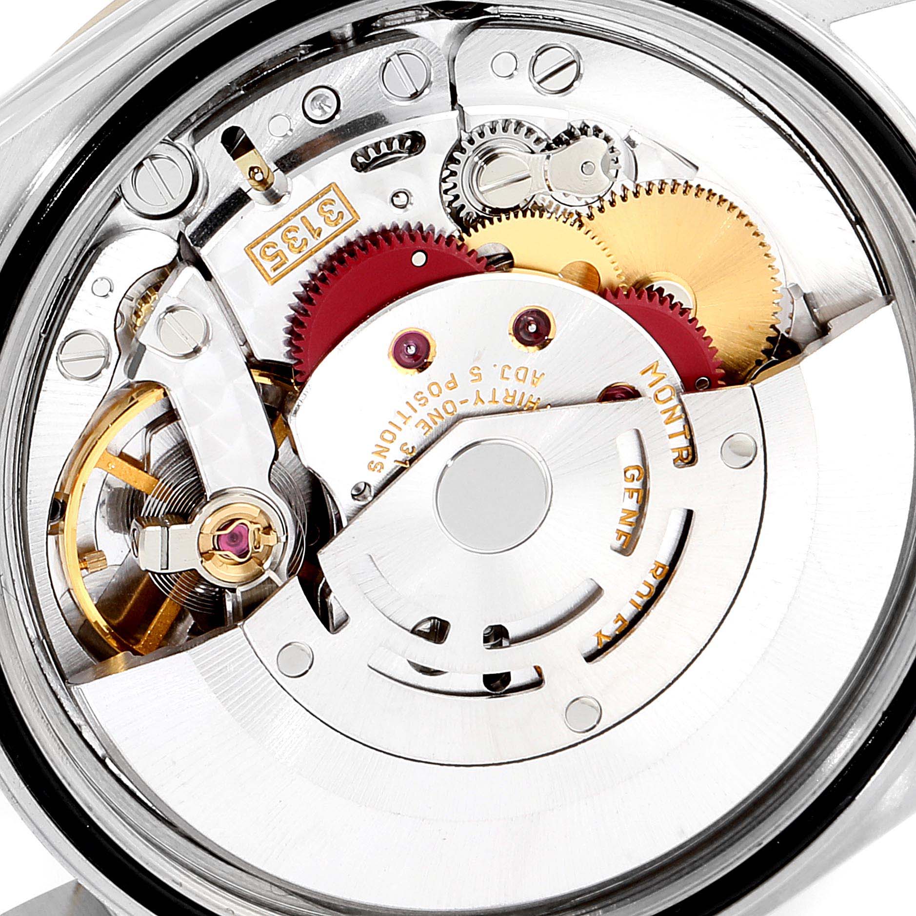 The image shows a close-up view of the inner mechanical movement of a Rolex Datejust 16233 Men's Steel and Gold (two tone) Blue Dial 16233 Men's Steel and Gold (two tone) Blue Dial watch.