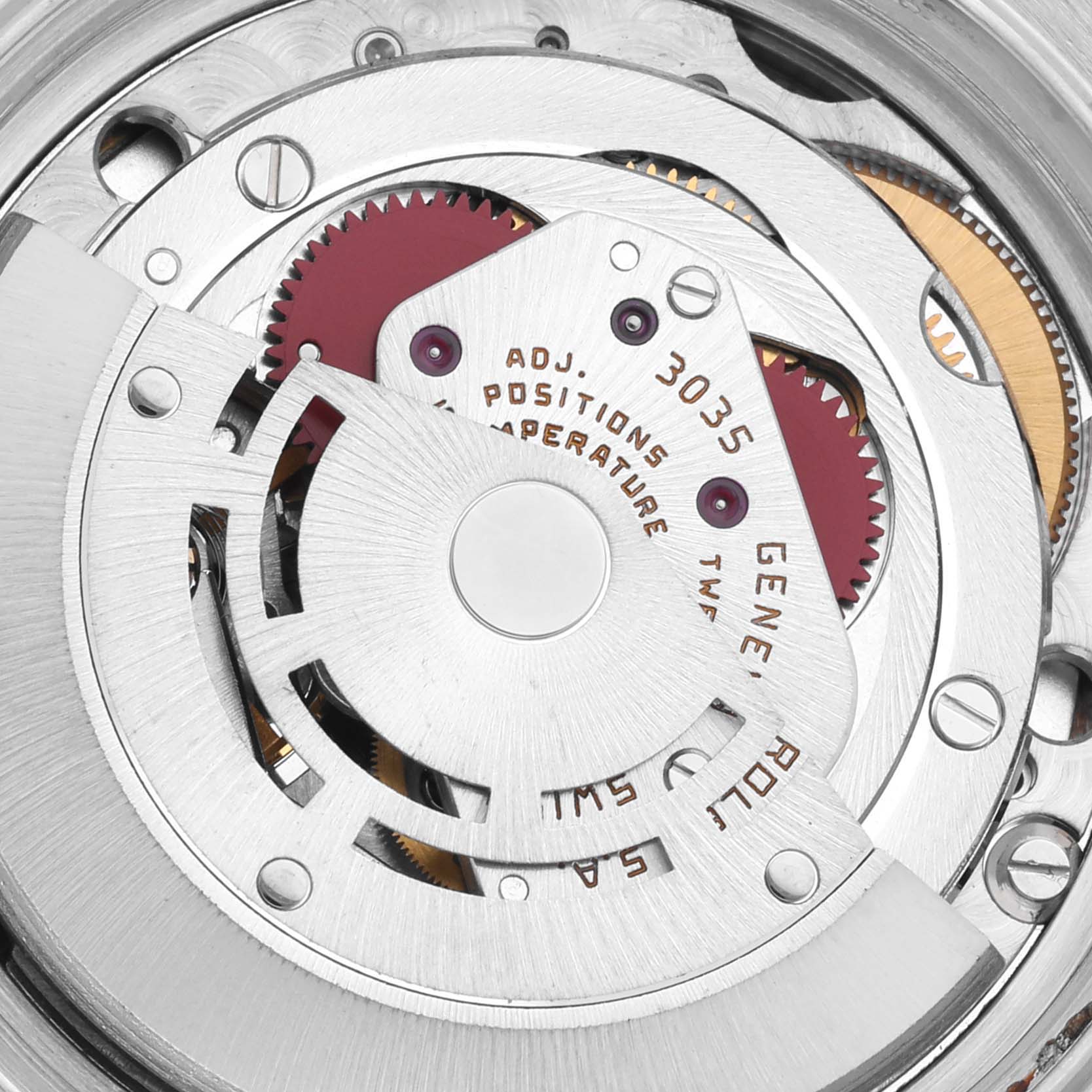 The image shows a close-up of the movement mechanism of the Vintage Collection model by Rolex.