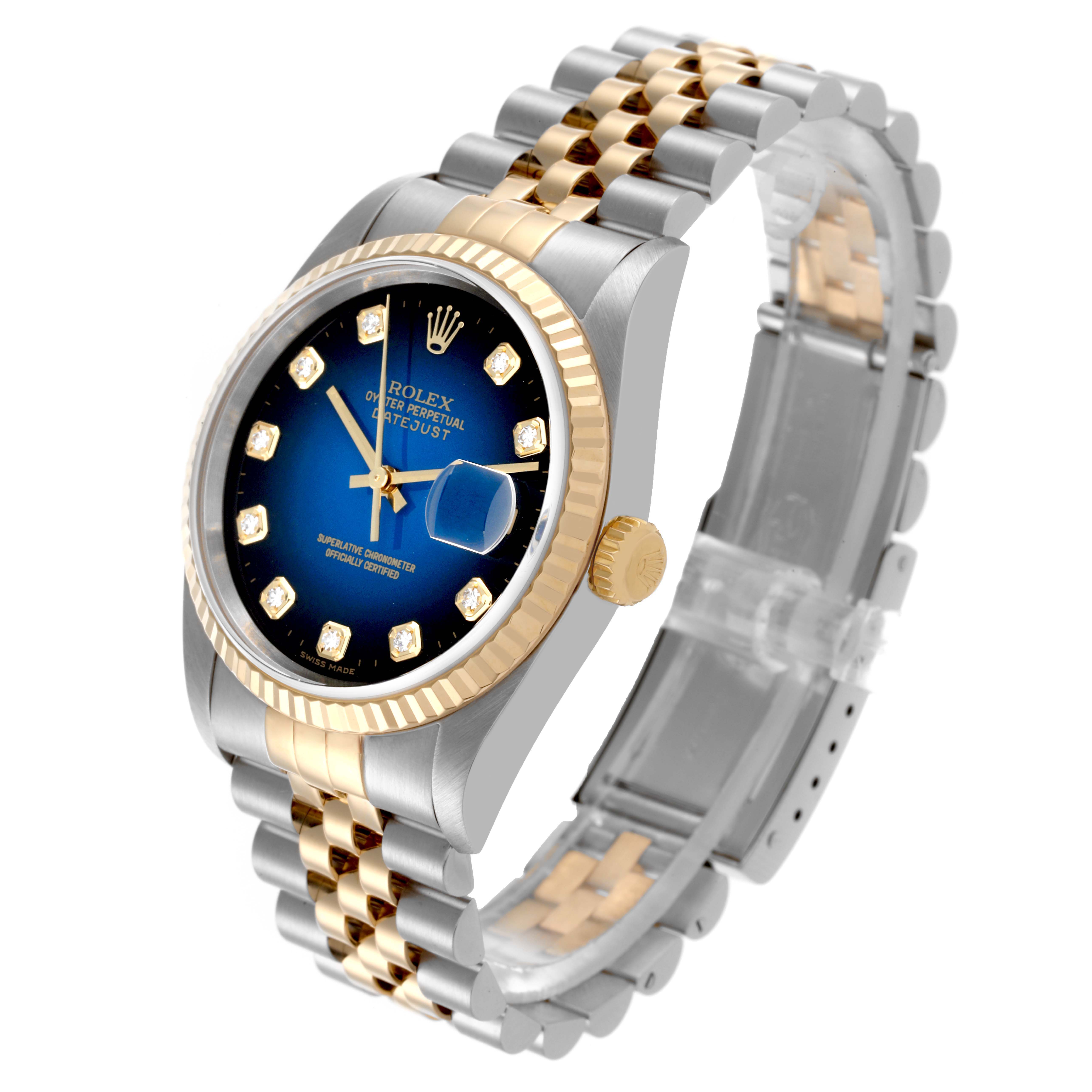 The Rolex Datejust 16233 Men's Steel and Gold (two tone) Blue Dial 16233 Men's Steel and Gold (two tone) Blue Dial watch is shown at a 3/4 angle, displaying the face, bezel, crown, and bracelet clearly.