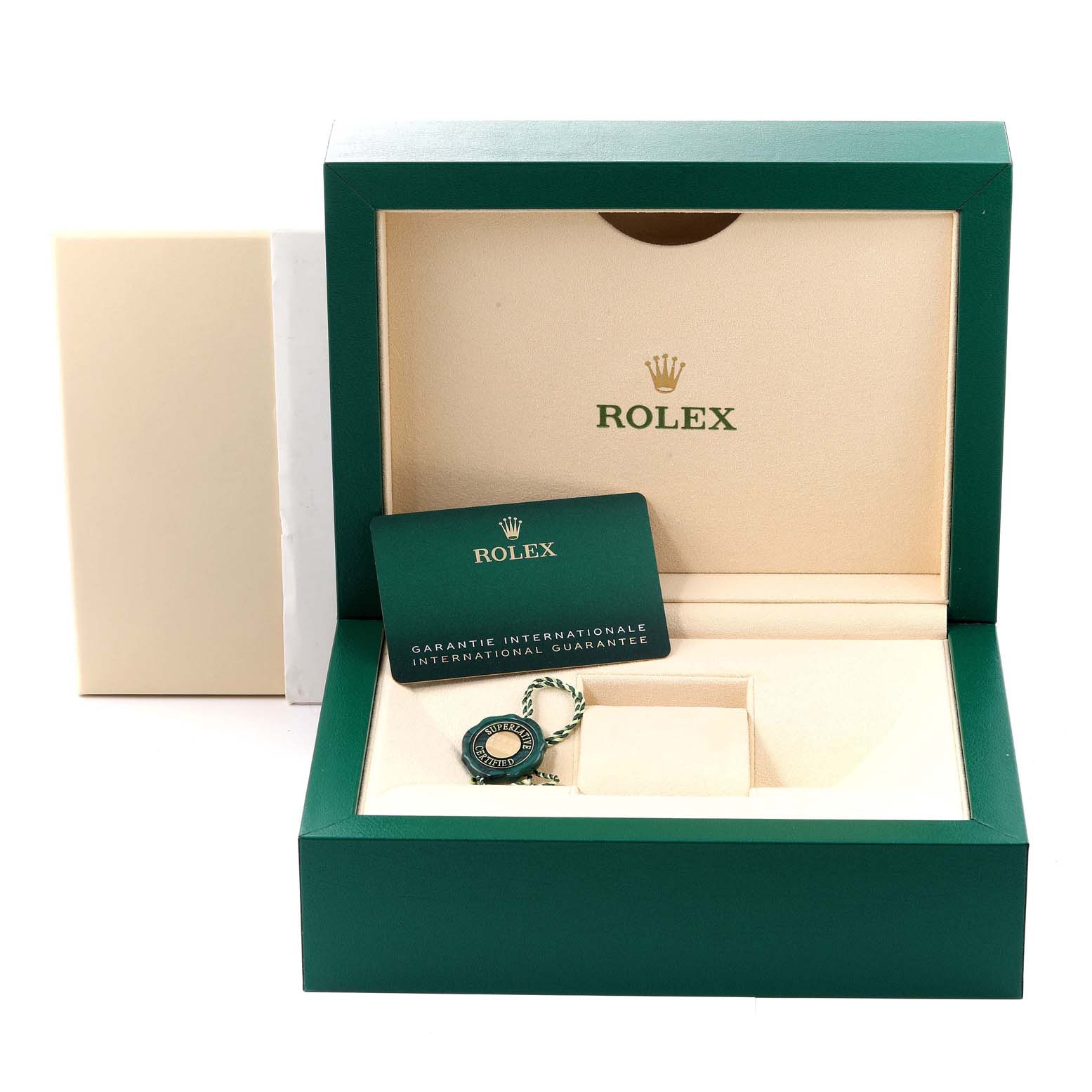 The image shows an open Rolex Daytona 116519 Men's White Gold Grey Dial 116519 Men's White Gold Grey Dial watch box at eye level, revealing the guarantee card and a Rolex tag inside.