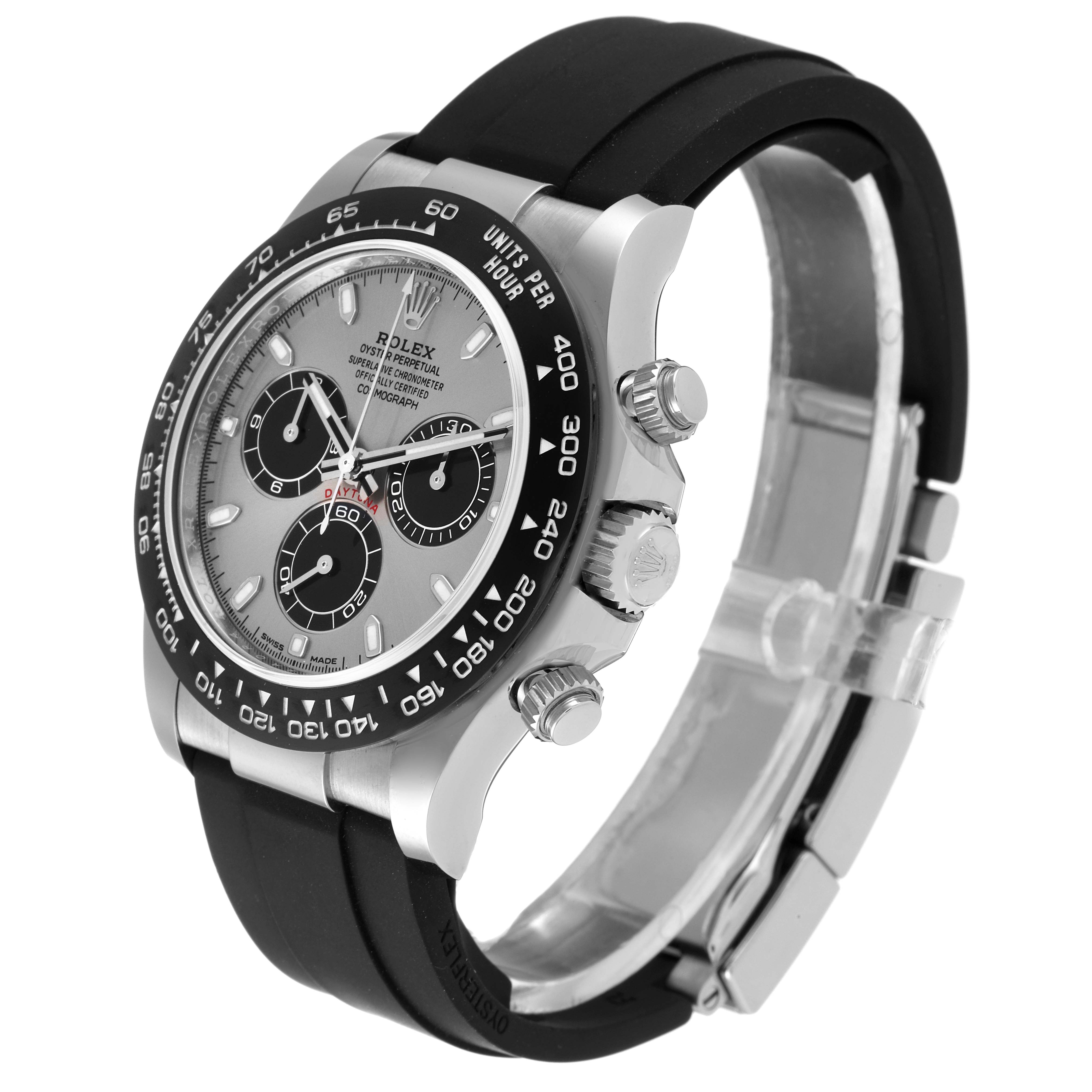 The Rolex Daytona 116519 Men's White Gold Grey Dial 116519 Men's White Gold Grey Dial model watch is shown from a side angle, displaying its face, bezel, pushers, and rubber strap.