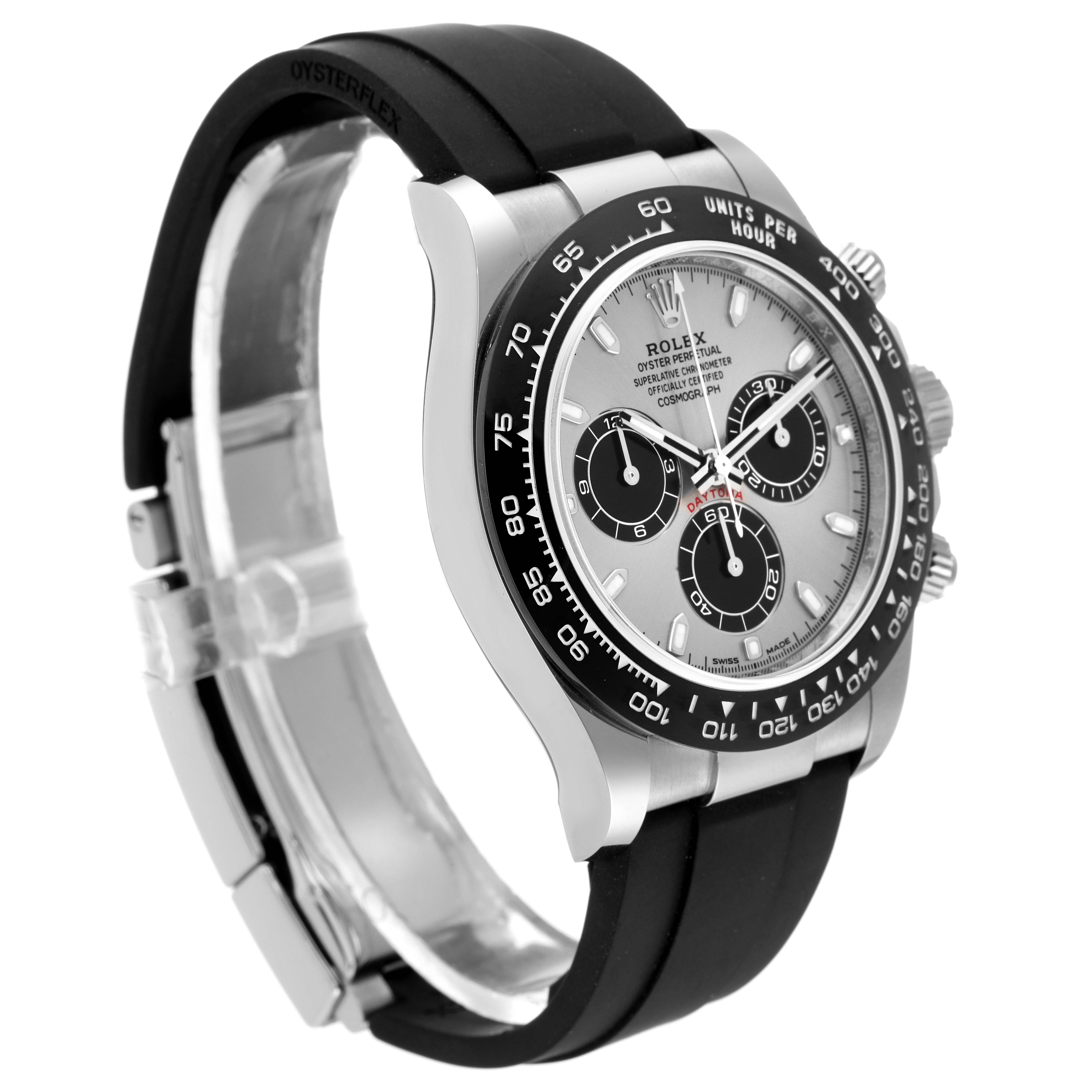 The image shows a Rolex Daytona 116519 Men's White Gold Grey Dial 116519 Men's White Gold Grey Dial watch from a side angle, highlighting its bezel, dial, pushers, and black strap.