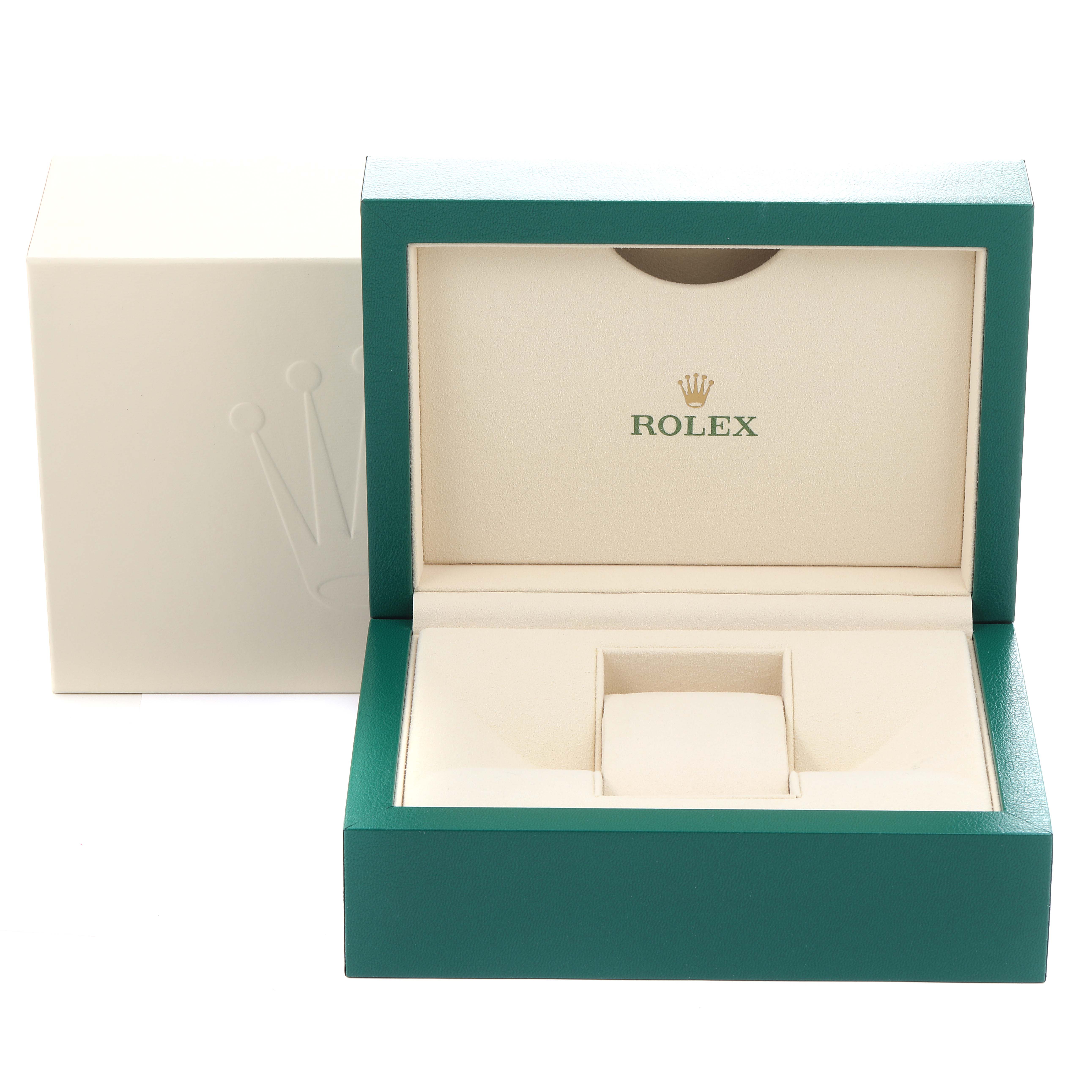 This image shows an open Rolex watch box for the Explorer model, featuring a green and beige color scheme.