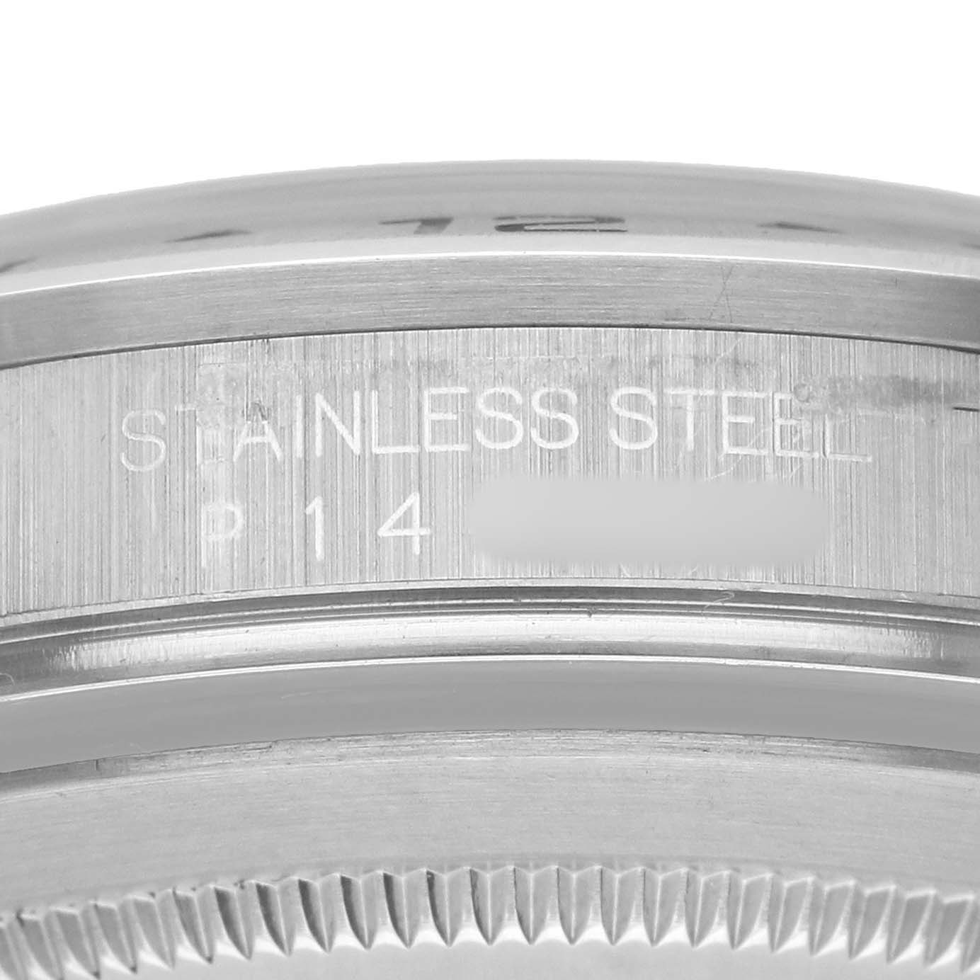 The image shows the edge and outer casing of the Rolex Explorer 16570 Men's Stainless Steel White Dial, highlighting its stainless steel material.