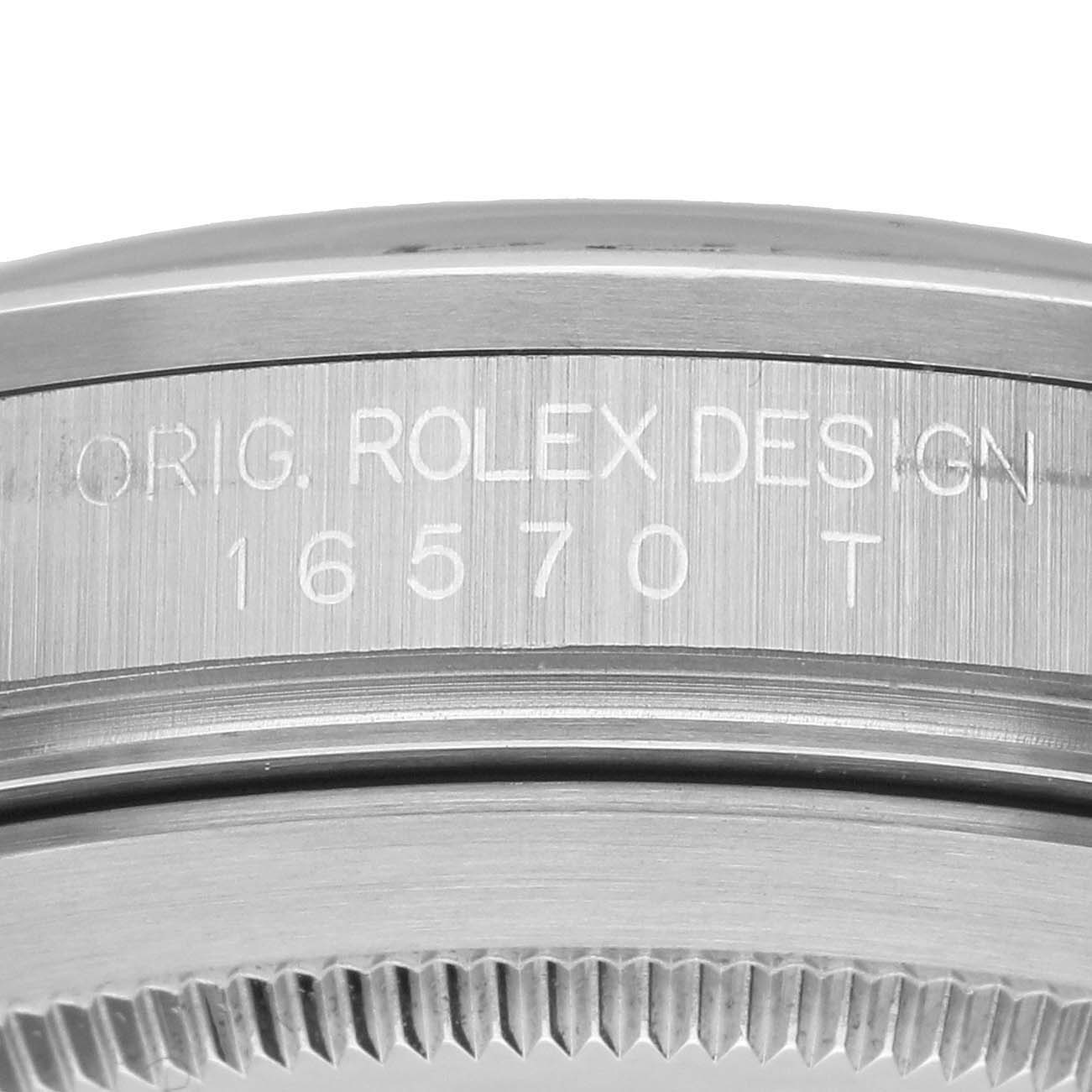 The image shows the side of the Rolex Explorer 16570 Men's Stainless Steel Black Dial's stainless steel case with engraved design numbers.