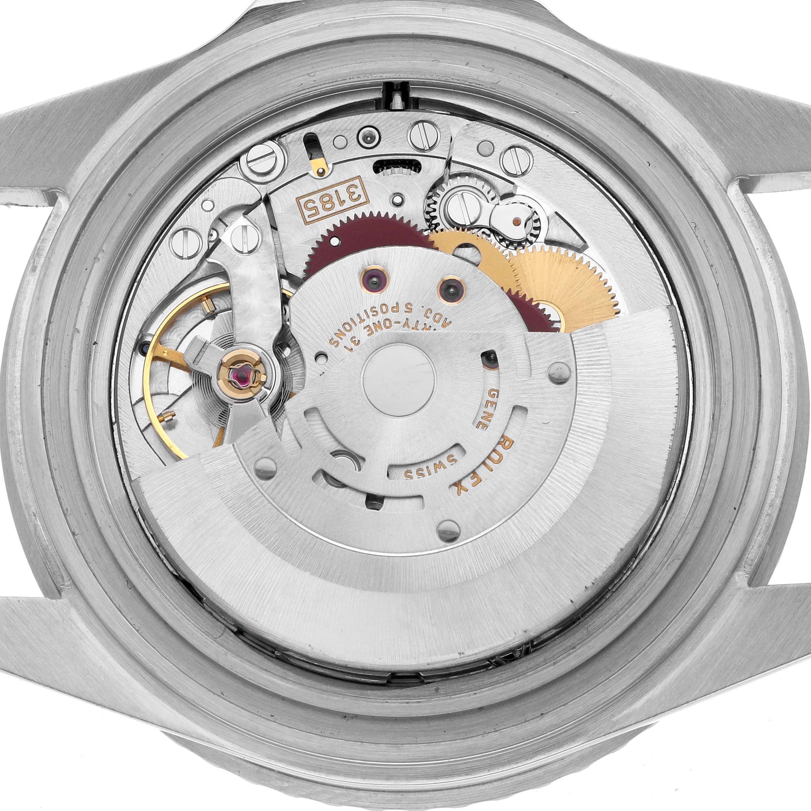 The image shows the open back view of a Rolex GMT-Master 16710 Men's Stainless Steel Black Dial, revealing its intricate movement and mechanism.