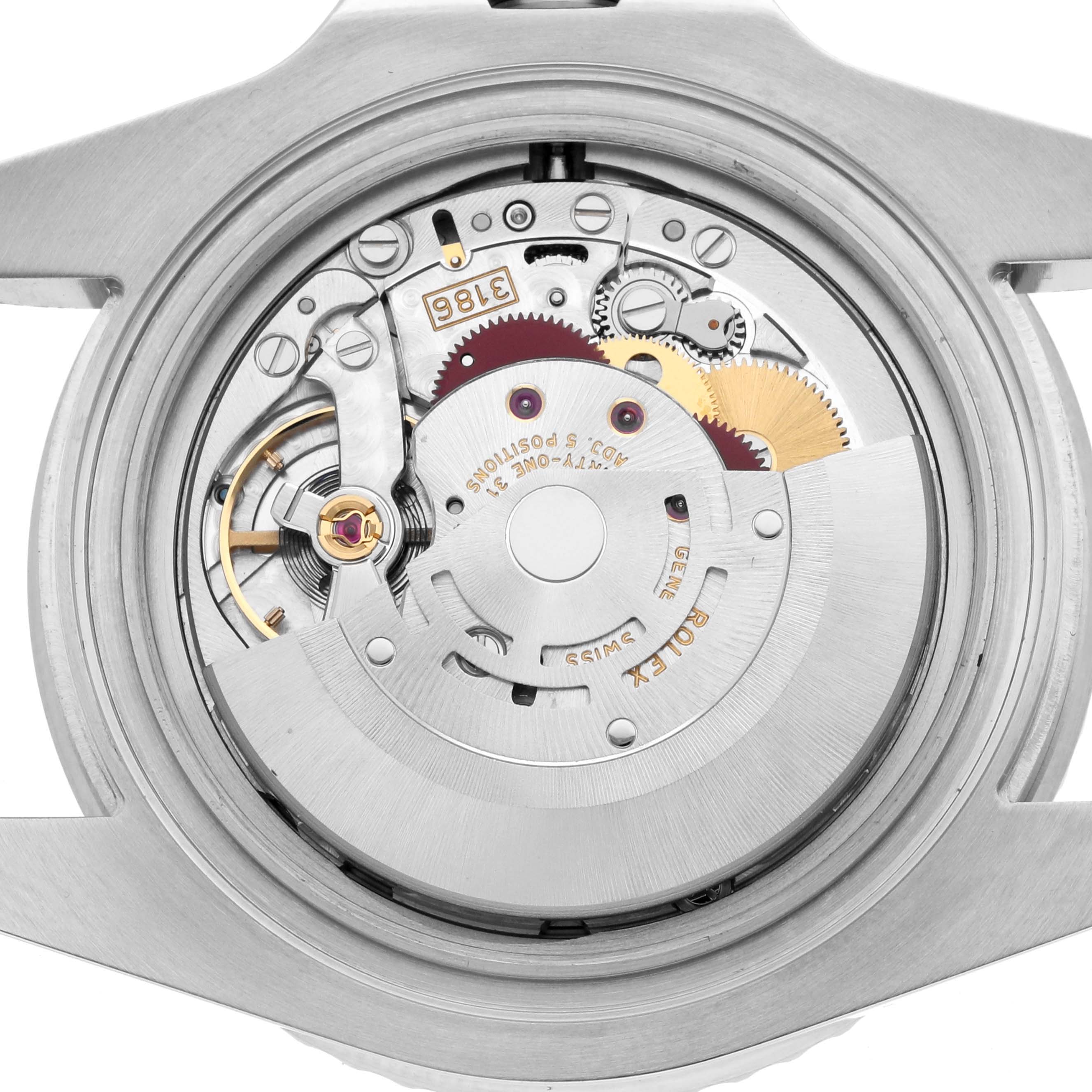 The image shows the movement from the back of a Rolex GMT-Master 116710 Men's Stainless Steel Black Dial, highlighting its intricate internal components.