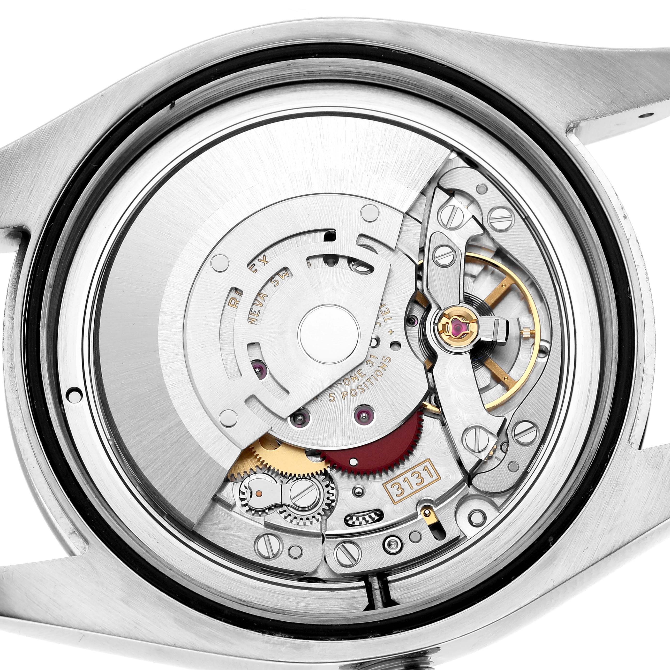 The image shows the back view of a Rolex Milgauss 116400GV Men's Stainless Steel Blue Dial watch, focusing on its intricate movement and components.